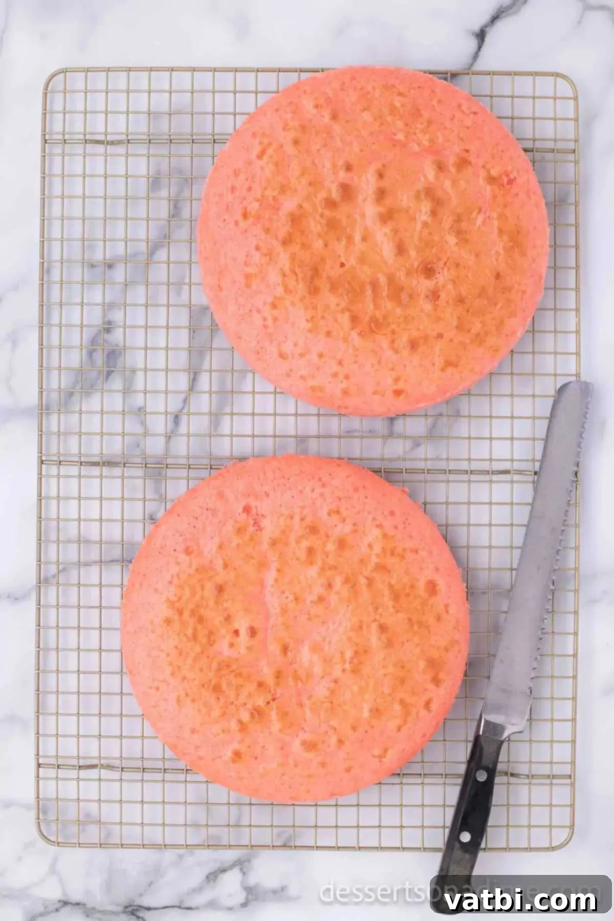 Heavenly Strawberry Crunch Cake 4 Cakes on cooling rack.