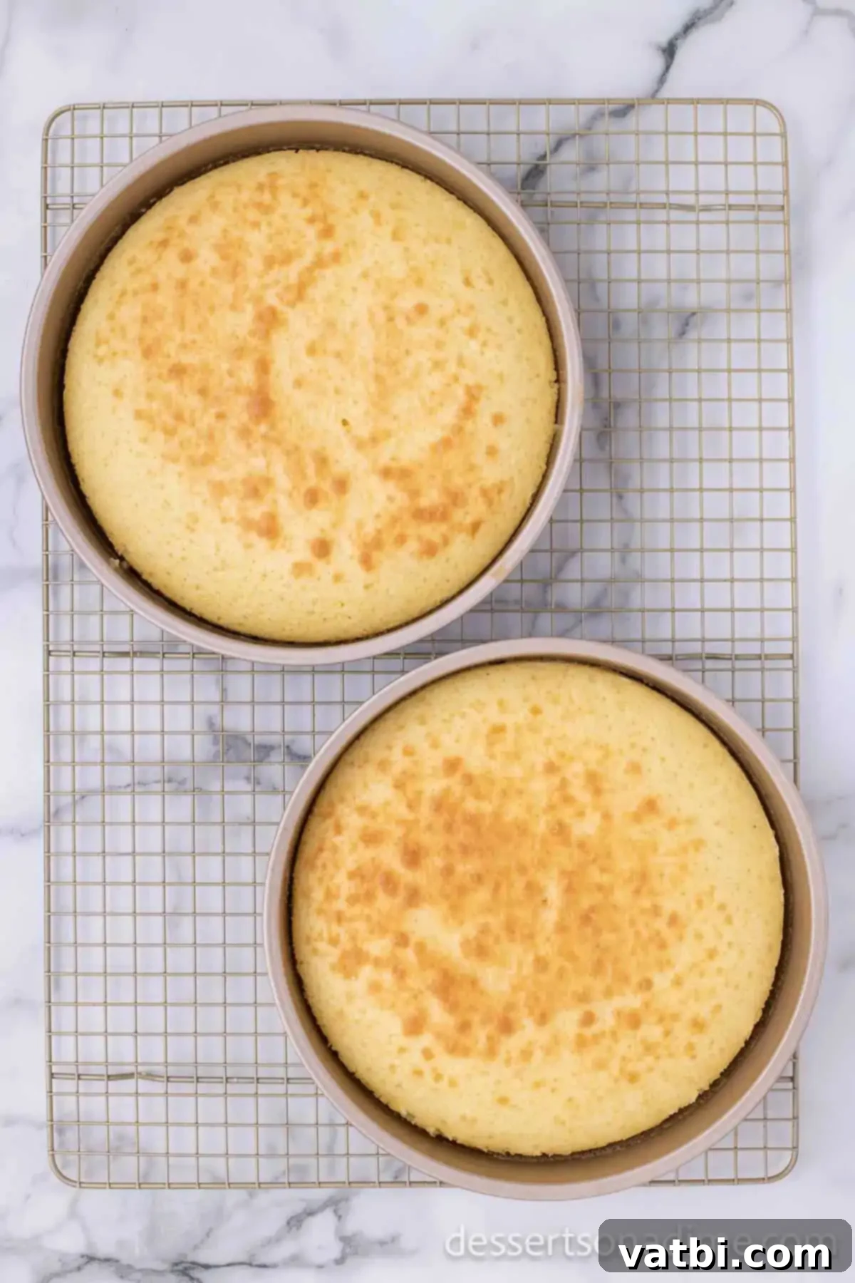 Heavenly Strawberry Crunch Cake 5 Cakes on cooling rack.