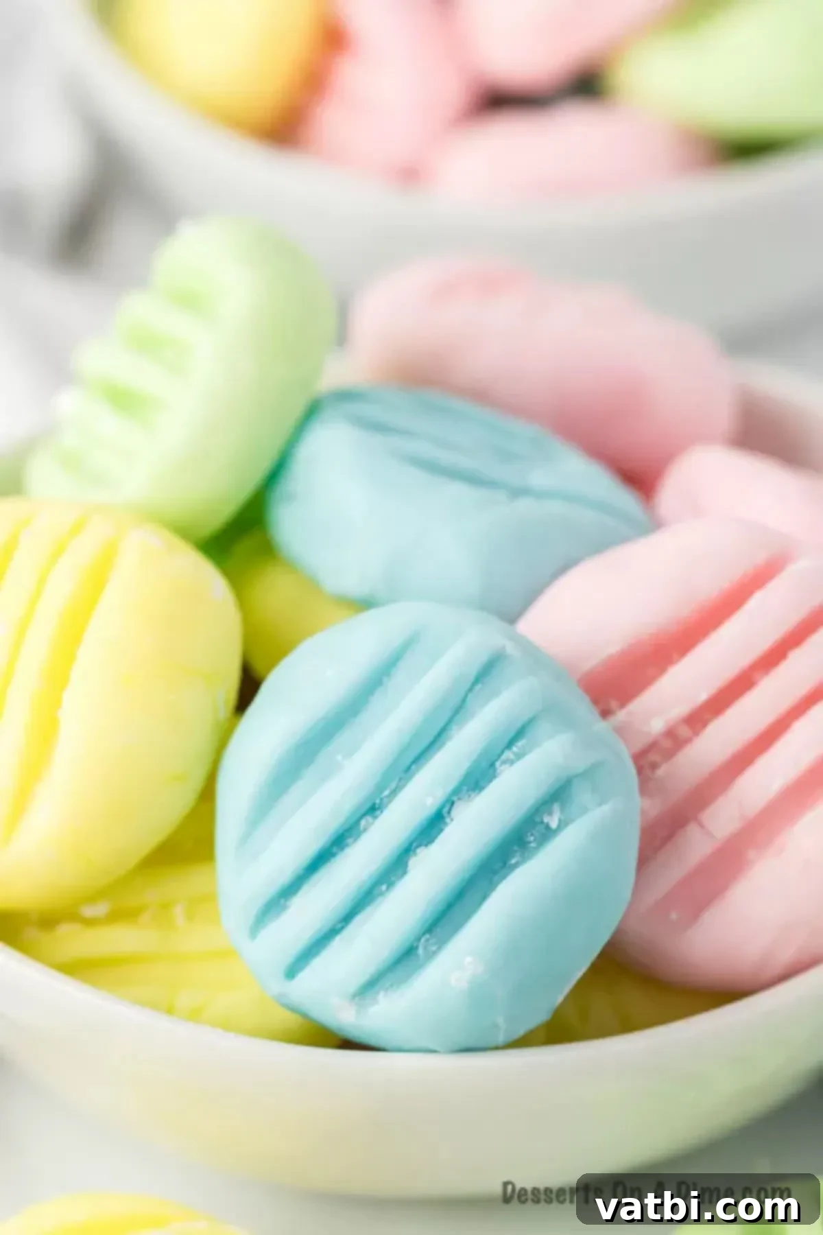 Pastel cream cheese mints in a bowl. 