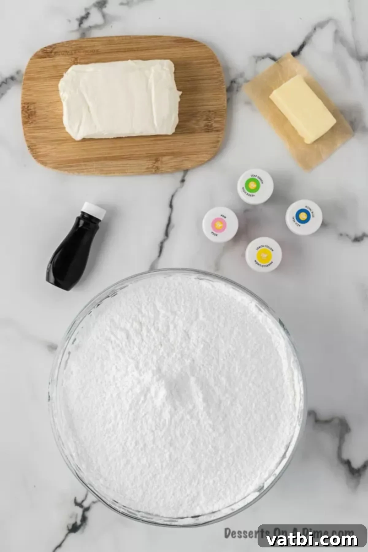 Ingredients for recipe: cream cheese, powdered sugar, butter, food coloring, peppermint extract. 
