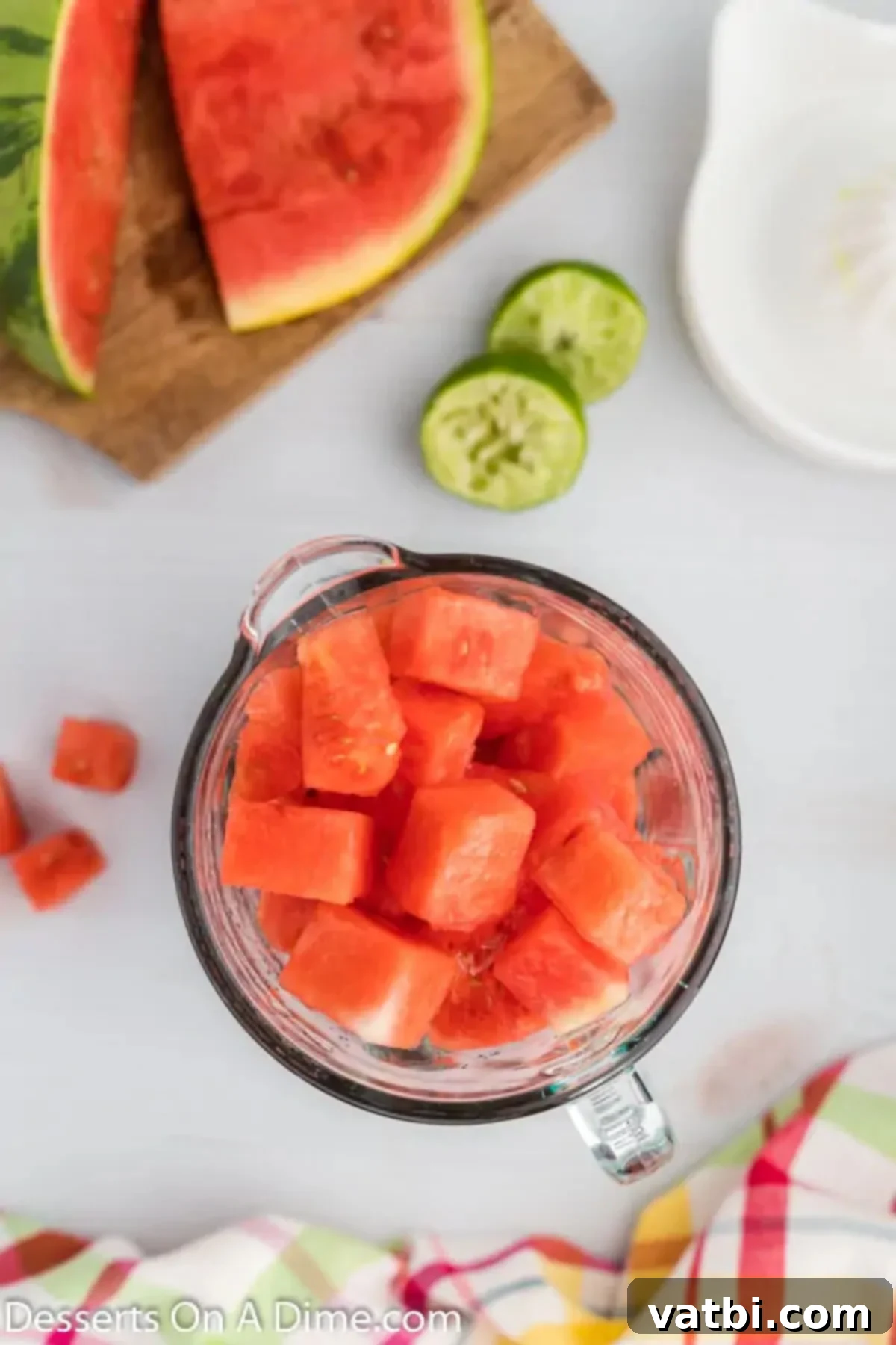 Summer Watermelon Treats 4 Cubed watermelon pieces placed inside a blender for processing.