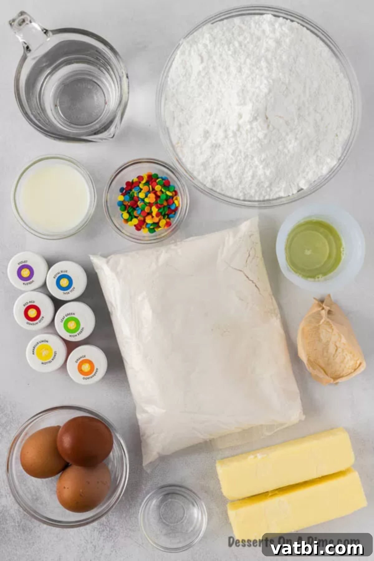 Spectrum Sweets 3 Ingredients for Rainbow Cupcakes: powdered sugar, cake mix, sprinkles, food coloring, oil, butter, eggs, and pudding.