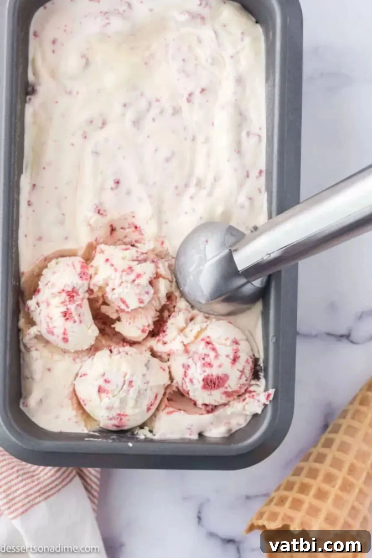 Red Velvet Ice Cream 8 Red Velvet Ice Cream in container being scooped.