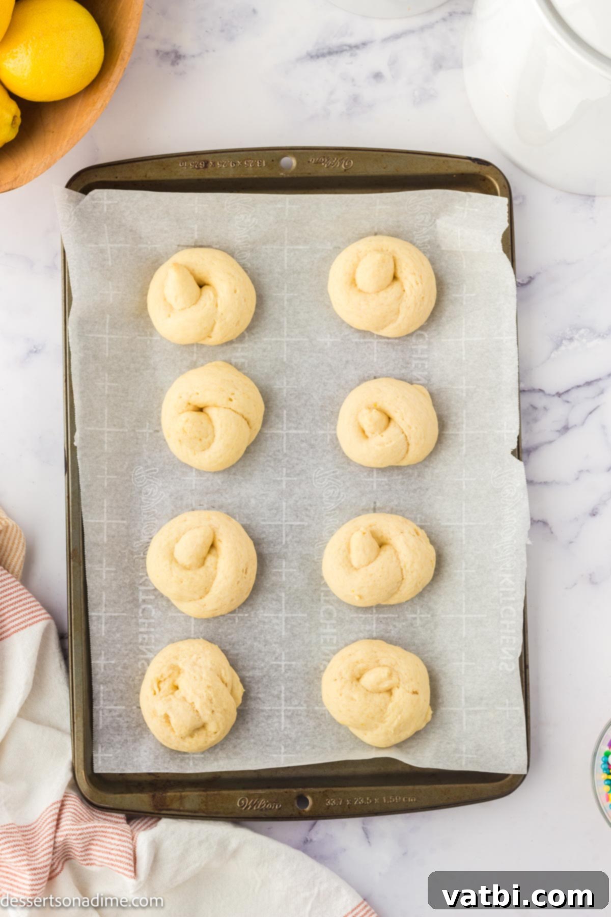 Italian Easter Cookies 9 Dough on baking sheet risen.