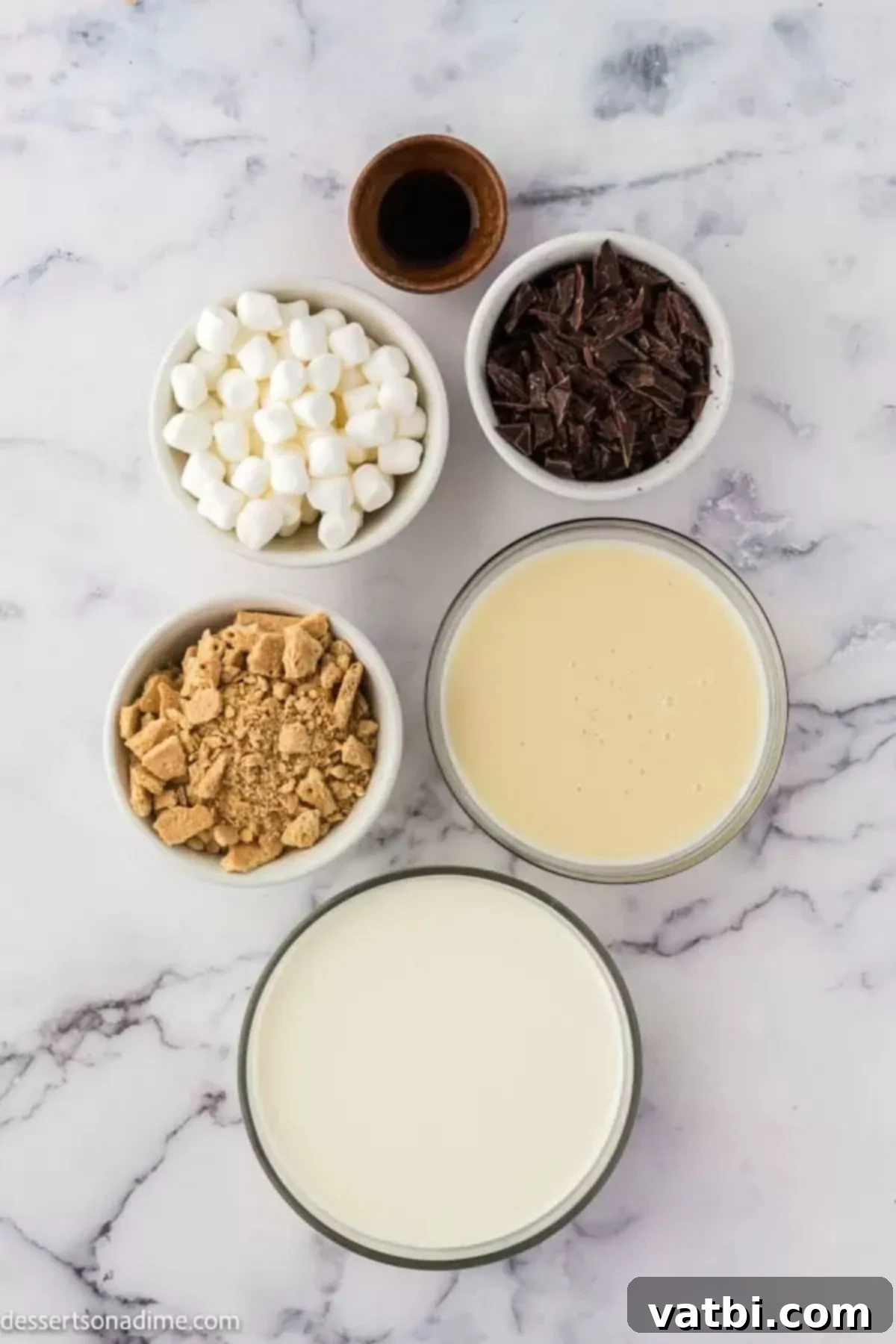 Irresistible Homemade S'mores Ice Cream 3 Ingredients for Smores ice cream- sweetened condensed milk, vanilla, graham crackers, chocolate.