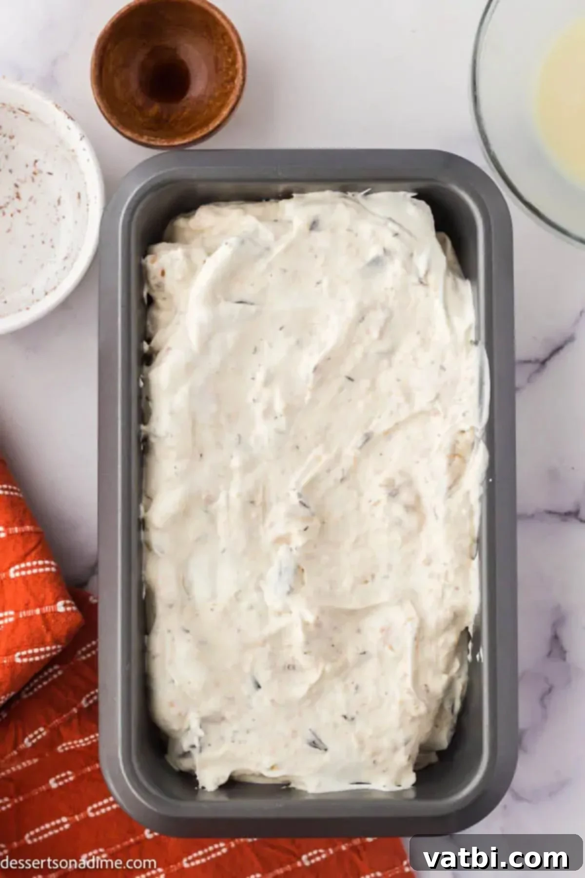 Irresistible Homemade S'mores Ice Cream 6 Mixture in loaf pan.