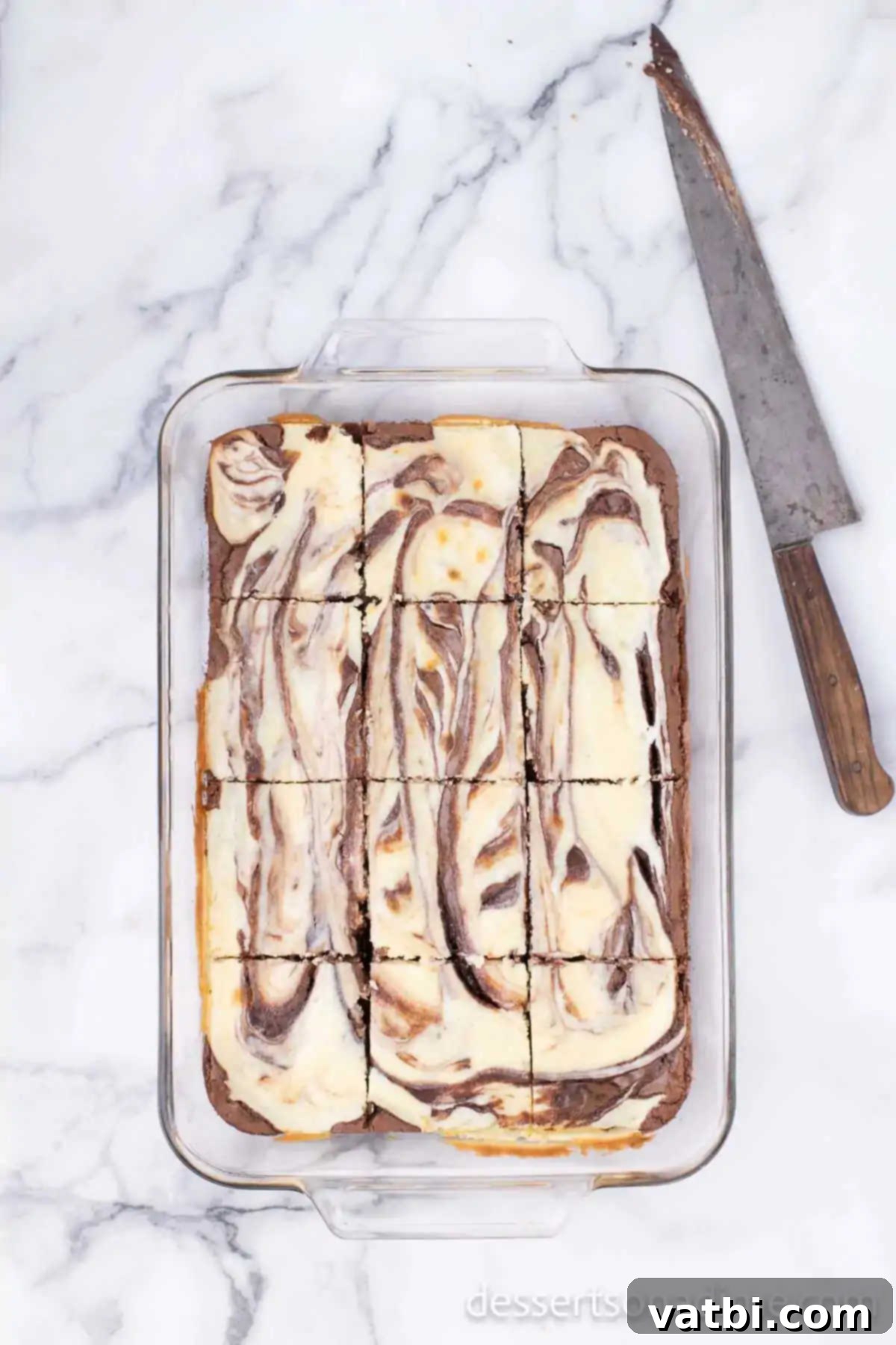 Decadent Cream Cheese Swirl Brownies 6 Brownies baked and cut for serving.