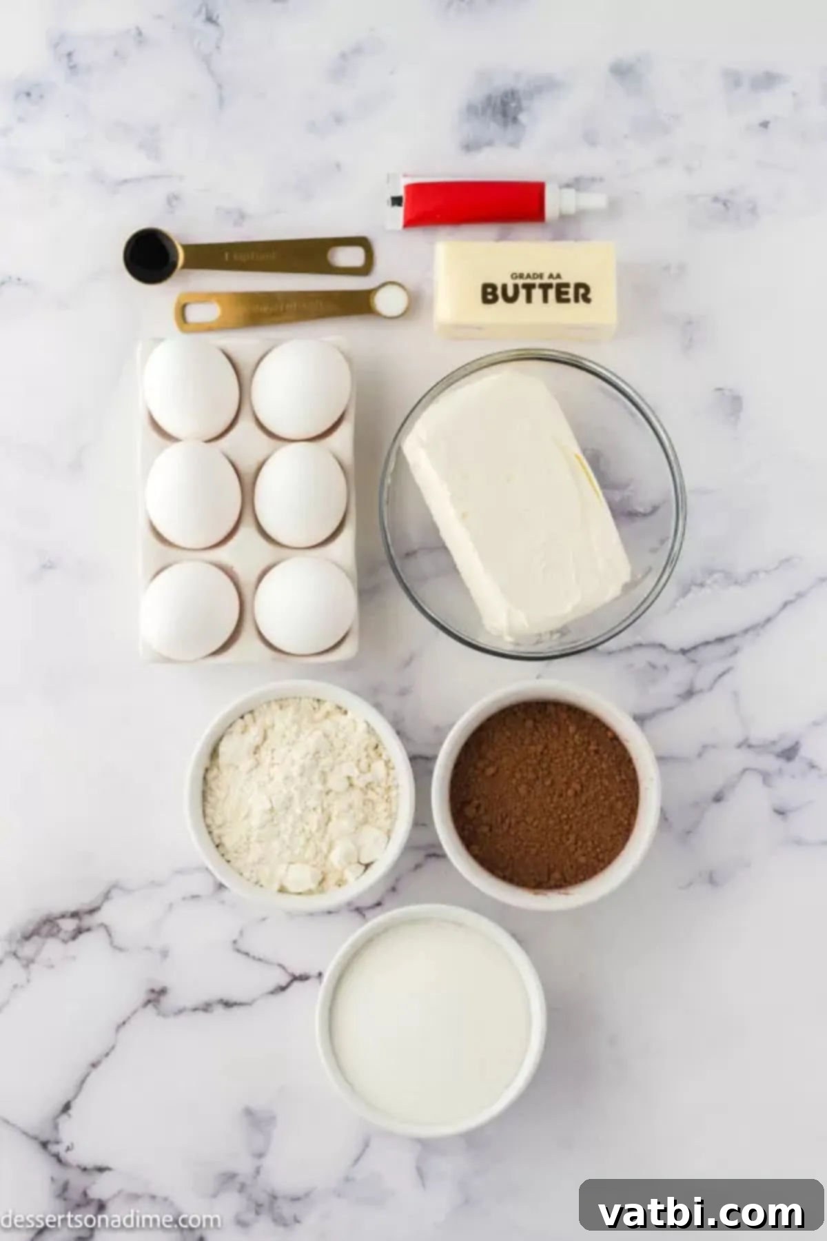 Ingredients for Red velvet cheesecake brownies - cocoa powder, food coloring, cream cheese, eggs, milk, flour, sugar, butter, vanilla, salt.