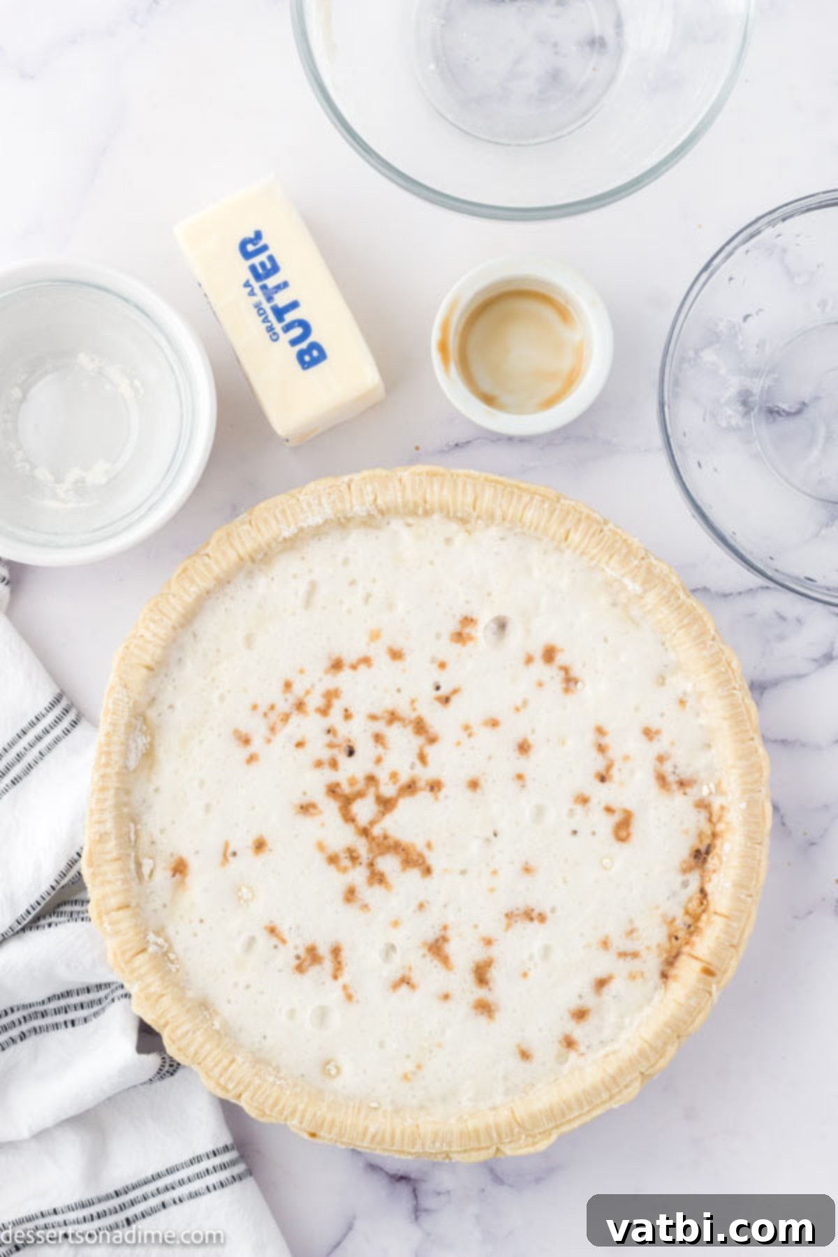 Bubbly Lemon-Lime Pie 5 Sprinkling vanilla extract over the pie mixture.