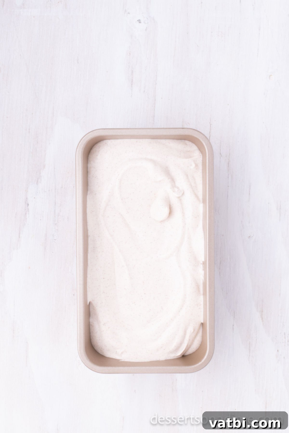 Warm Cinnamon Dream 6 Ice cream mixture poured into a loaf pan, ready for freezing.