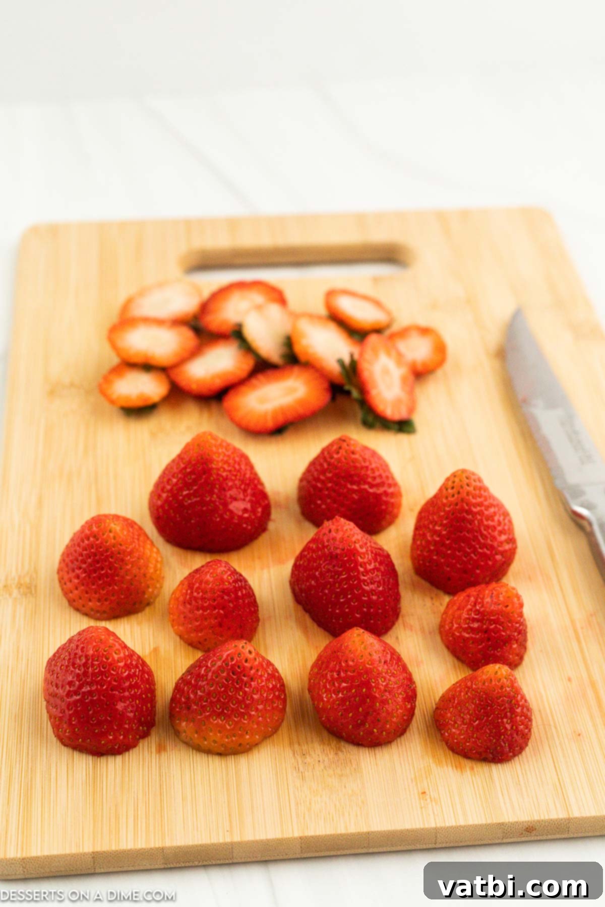 Strawberries on cutting board. 