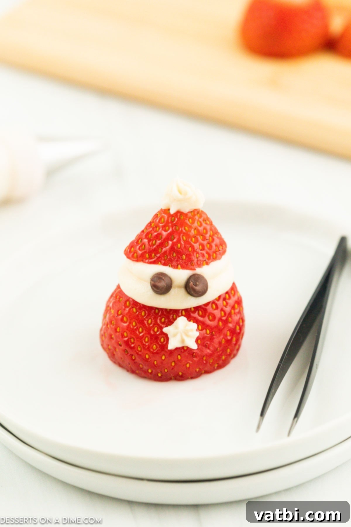 Chocolate chips added to each strawberry. 