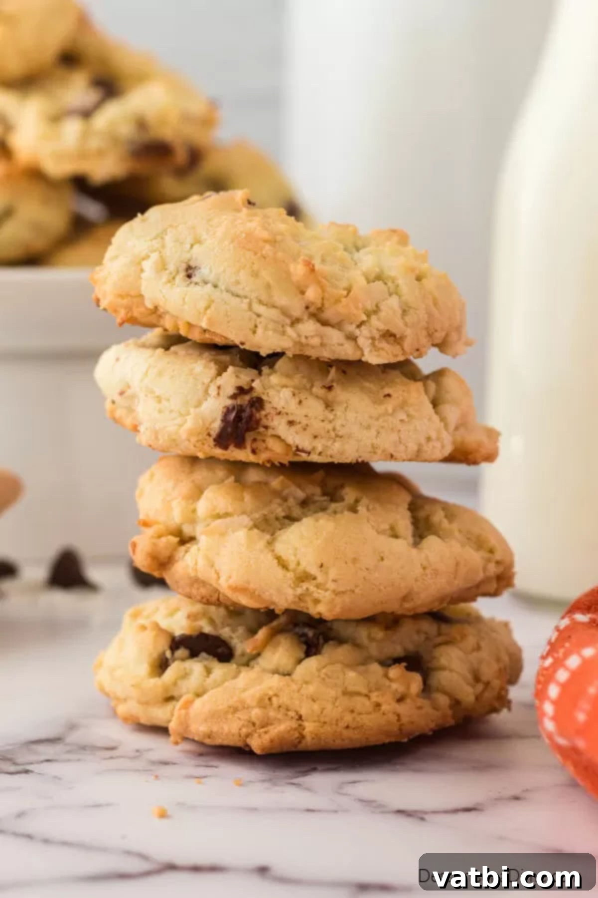 Island Chocolate Chip Bliss 2 Coconut chocolate chip cookies stacked together.
