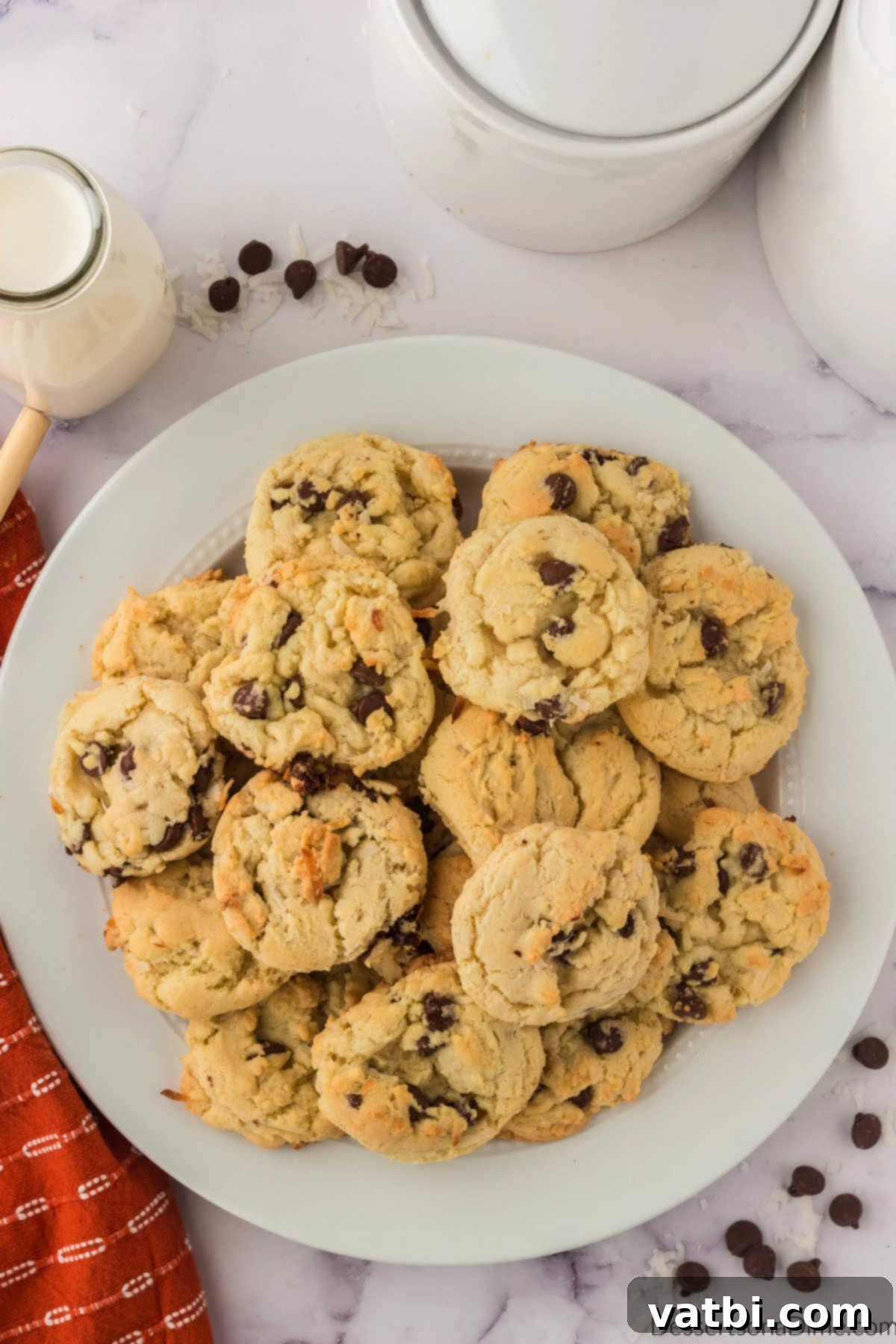 Island Chocolate Chip Bliss 4 Coconut chocolate chip cookies on a plate.