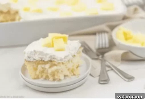 A light and fluffy pineapple angel food cake, perfectly golden brown.