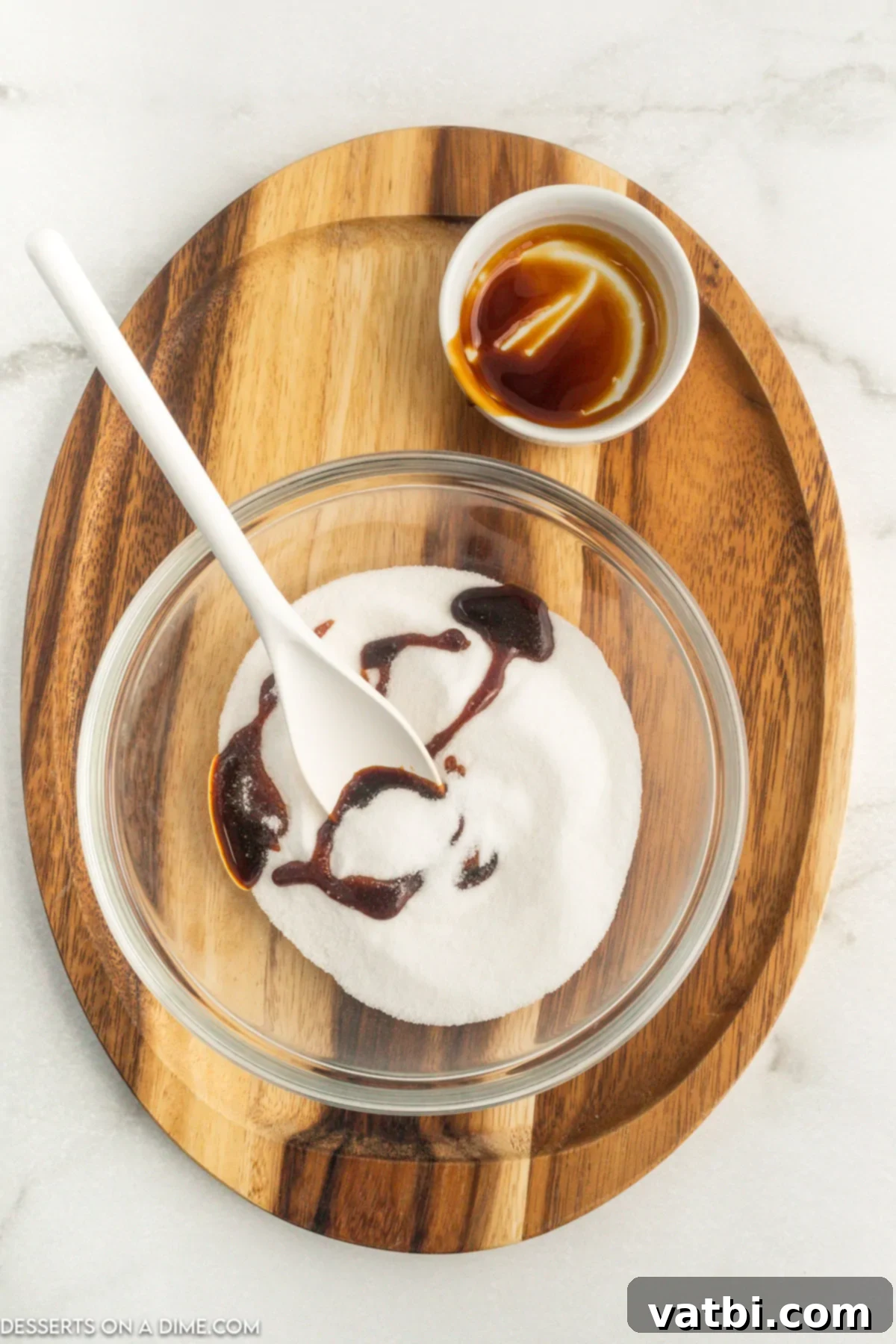 Make Your Own Brown Sugar 4 White sugar combined with molasses in a bowl.
