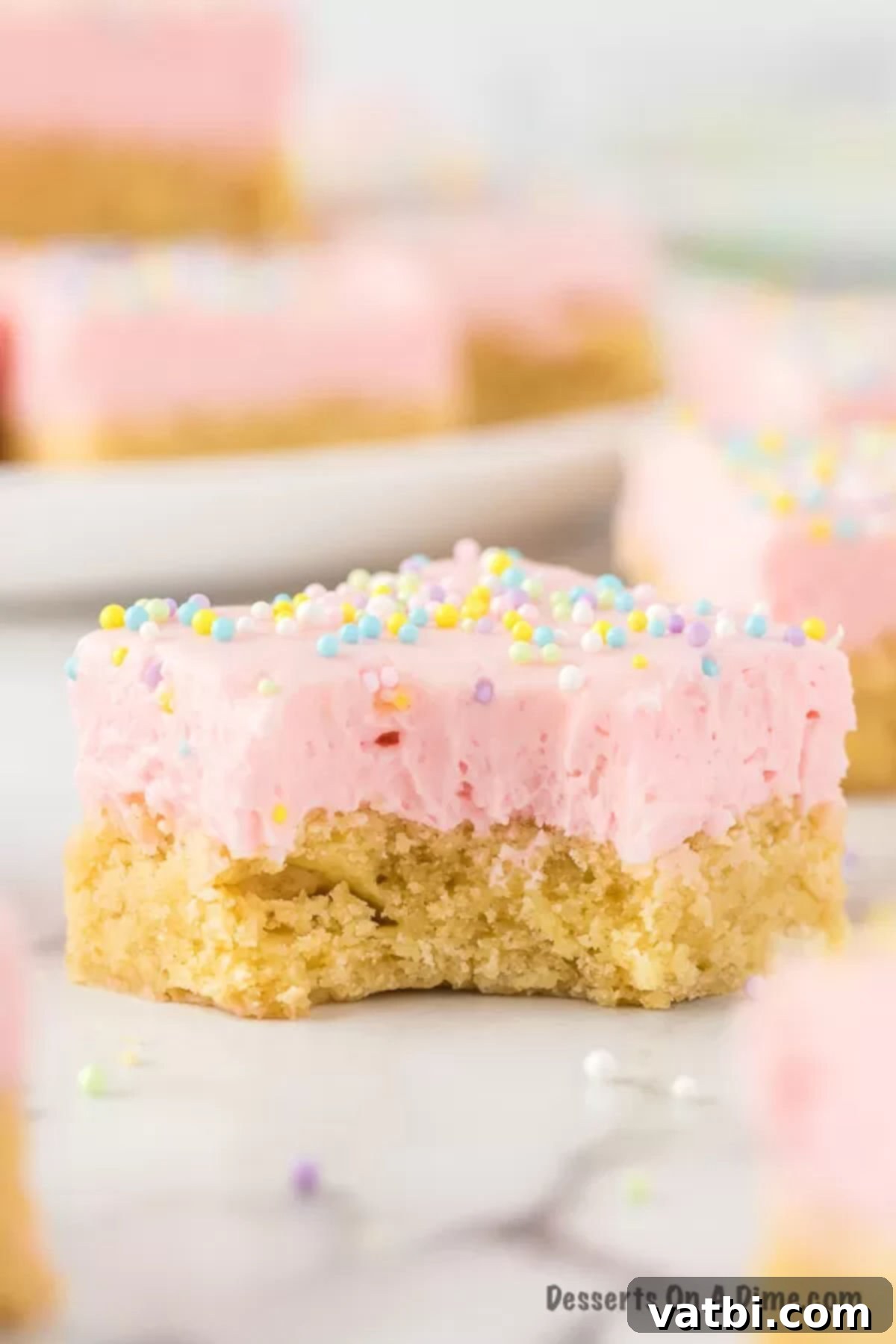 Homemade Sugar Cookie Squares 11 Frosted sugar cookie bars cut into squares and ready to serve.