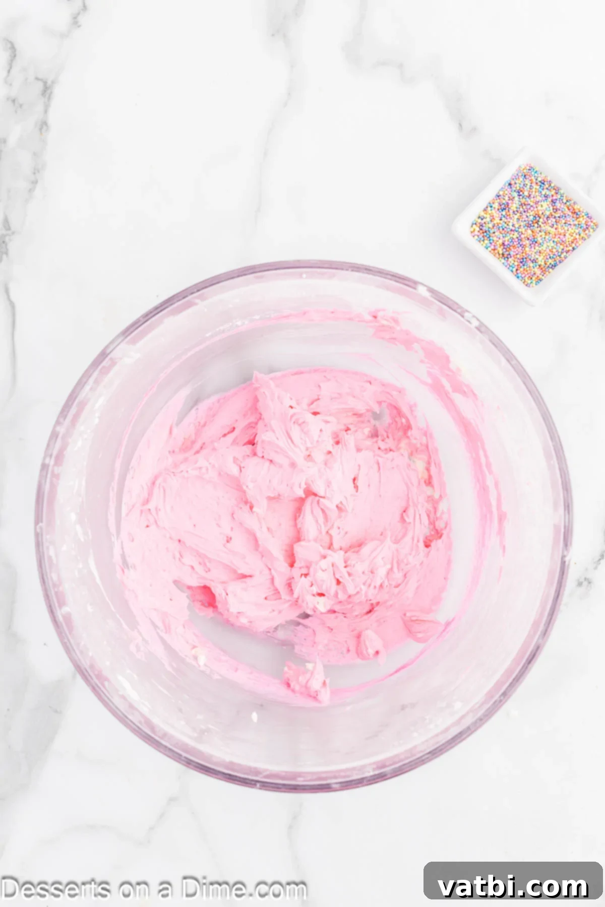 Homemade Sugar Cookie Squares 9 Food coloring added to frosting, turning it pink.