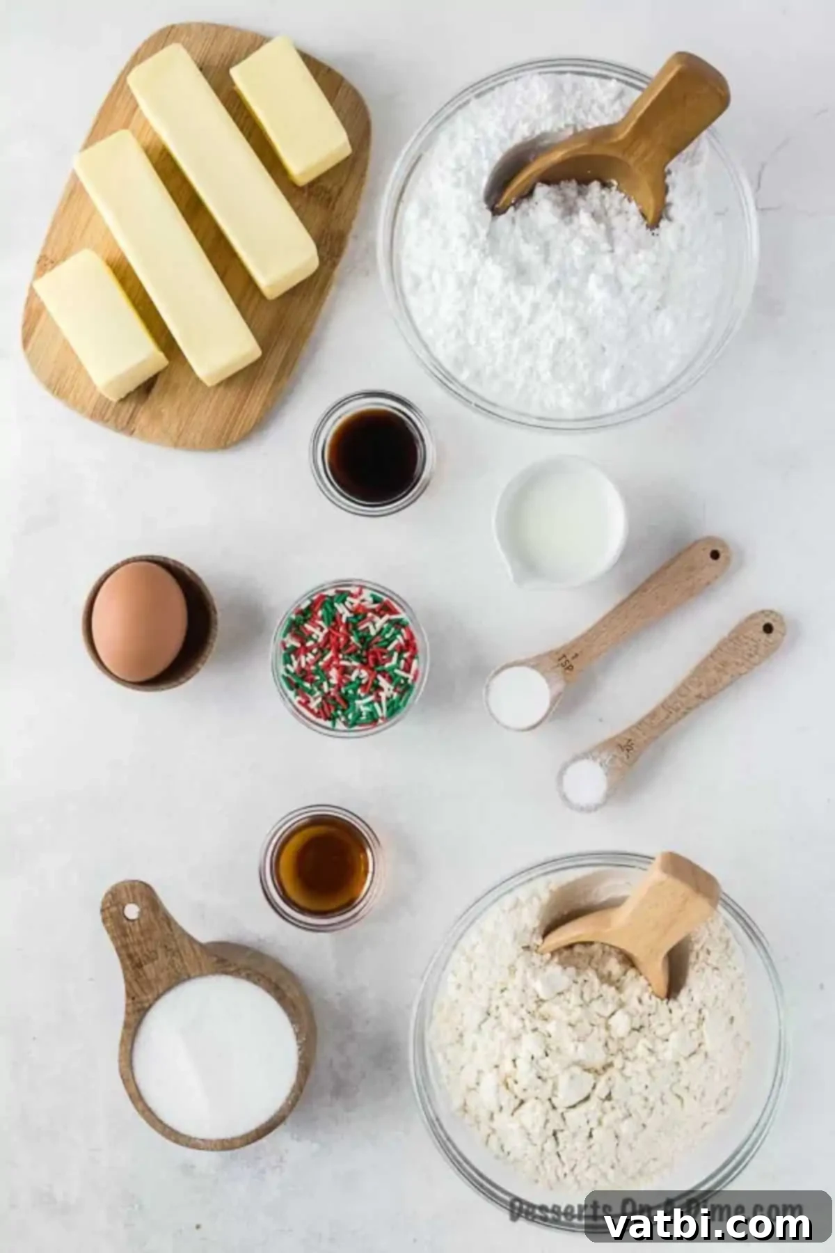 Frosted Christmas Sugar Cookie Bars 3 Ingredients for Christmas sugar cookie bars - butter, egg, vanilla, flour, powdered sugar, milk, sprinkles.