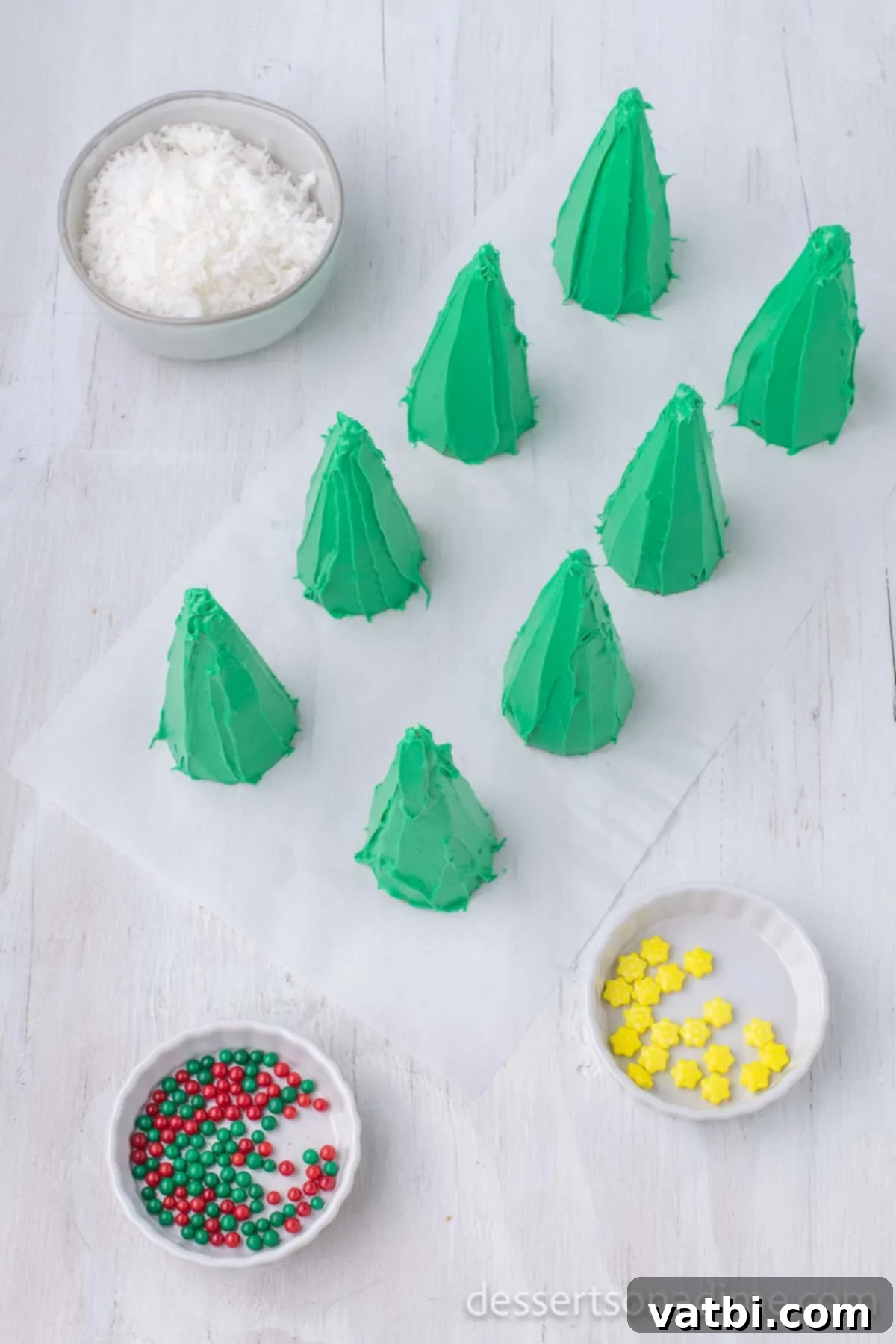 Sweet Ice Cream Cone Christmas Trees 7 A tray of assorted colorful candies and sprinkles, ready to be used as ornaments on the ice cream cone trees.