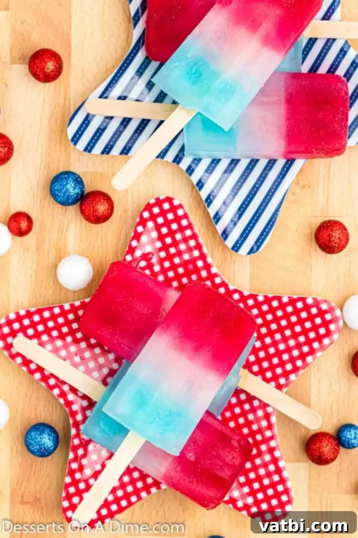 Red, White, and Blue: A Sweet Summer Celebration 8 Red white and blue popsicles on a tray.