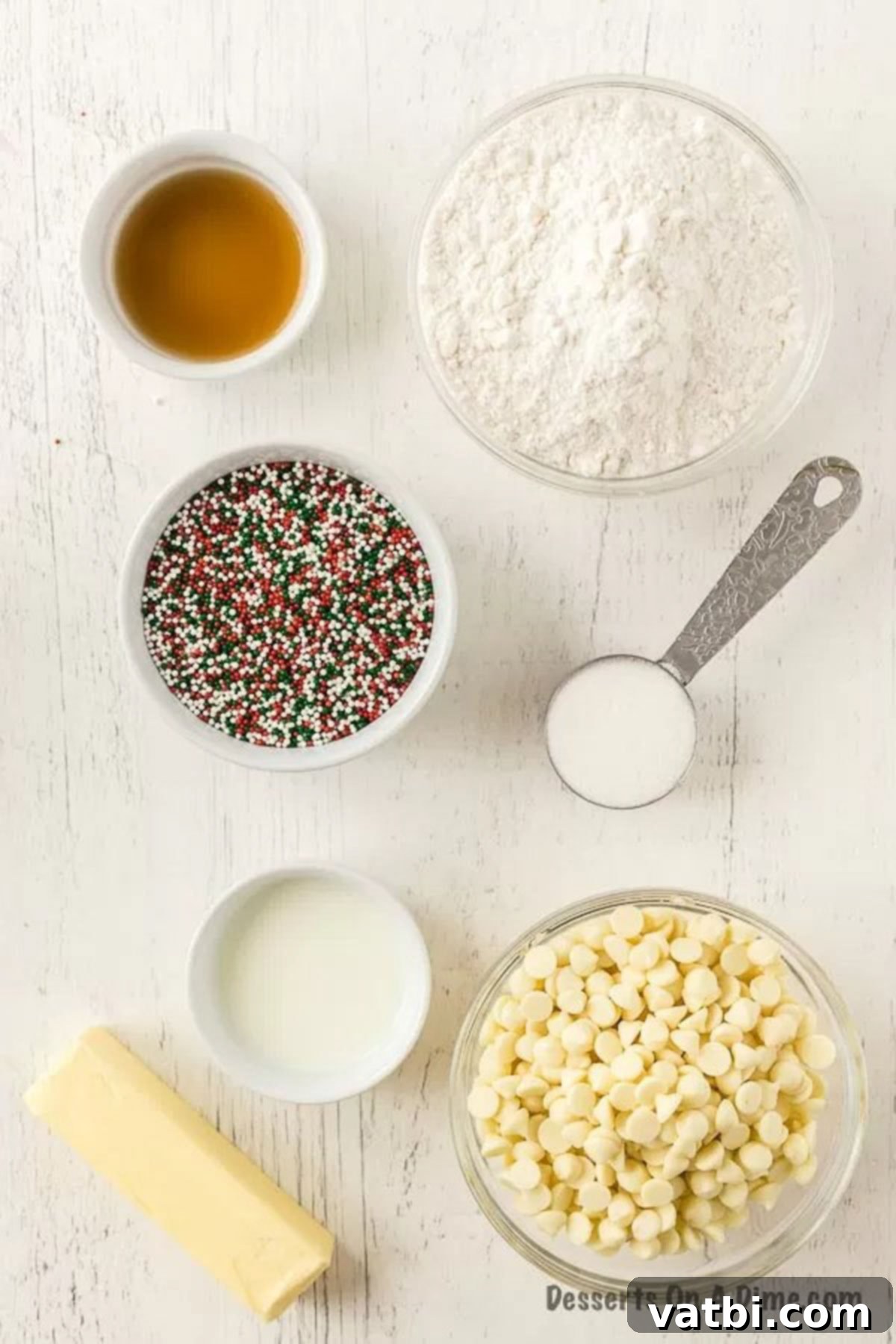 Holiday Truffle Magic 3 Christmas Truffle ingredients: unsalted butter, white cake mix, vanilla extract, Christmas sprinkles, and white chocolate chips.