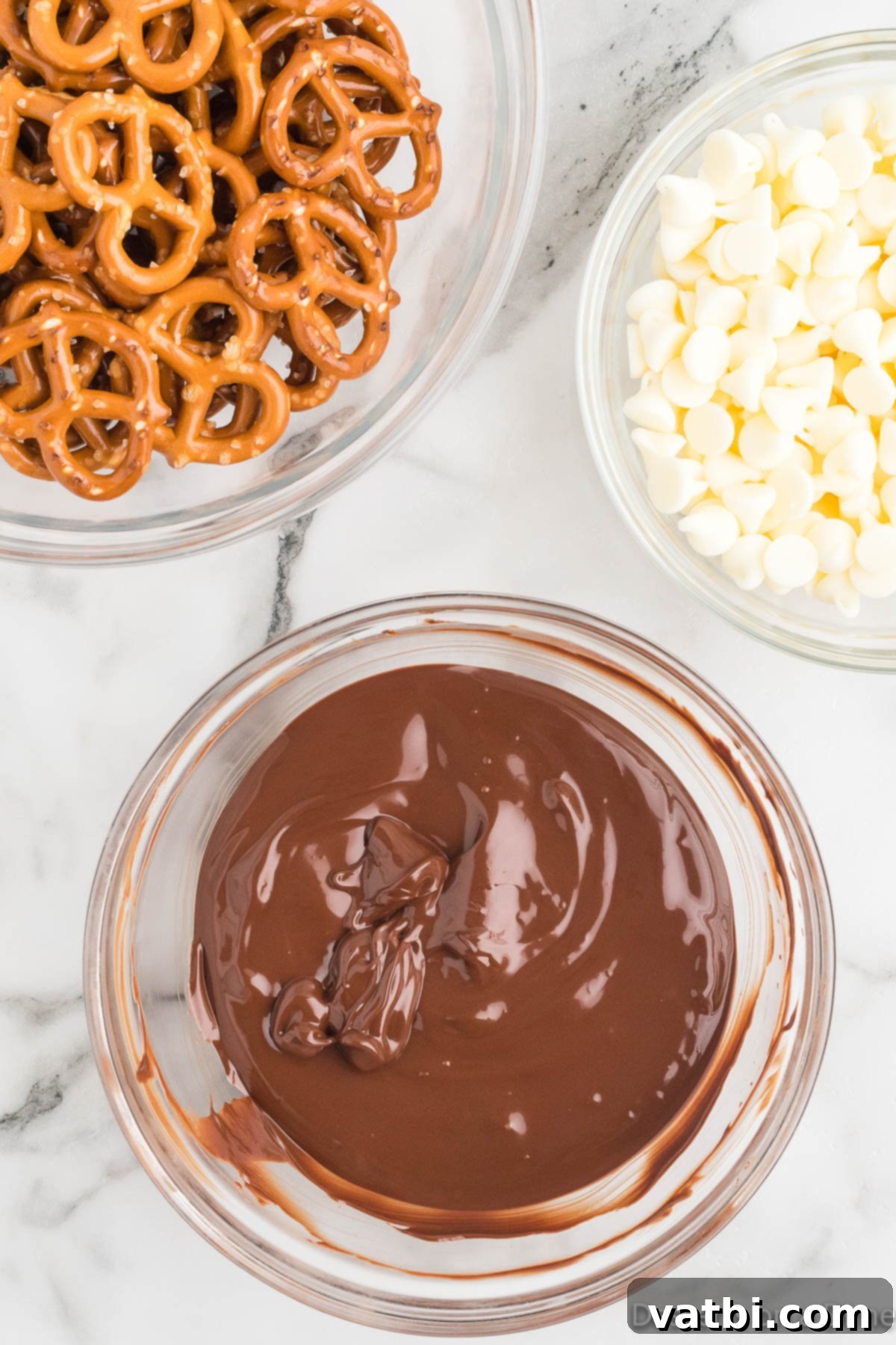 Sweet & Salty Pretzel Bliss 4 A bowl filled with smoothly melted milk chocolate, ready for dipping pretzels.