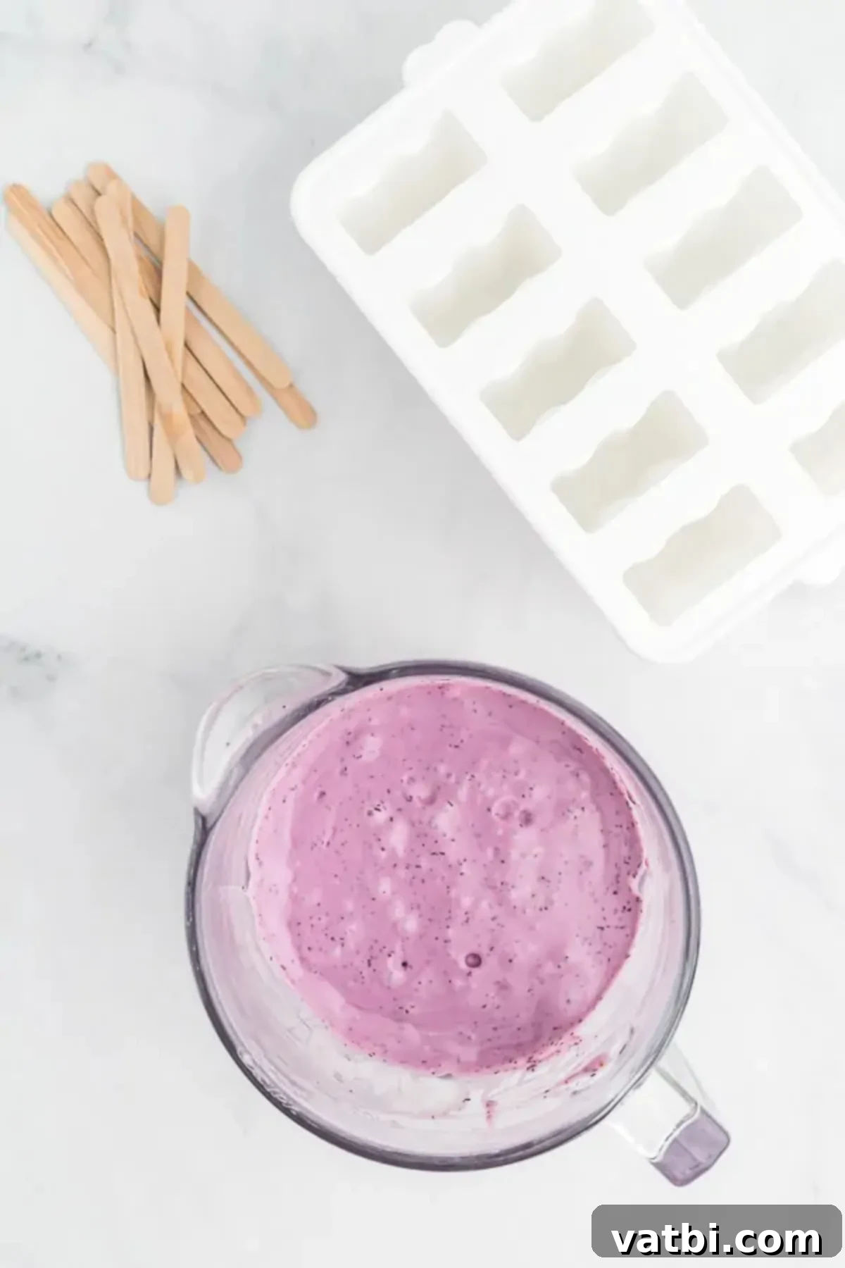 Berry Bliss Yogurt Pops 4 Bowl with all popsicle ingredients combined and ready to blend