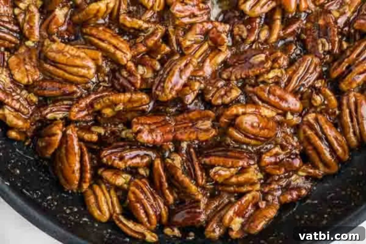 Delicious, sweet, and crunchy candied pecans made on the stovetop.