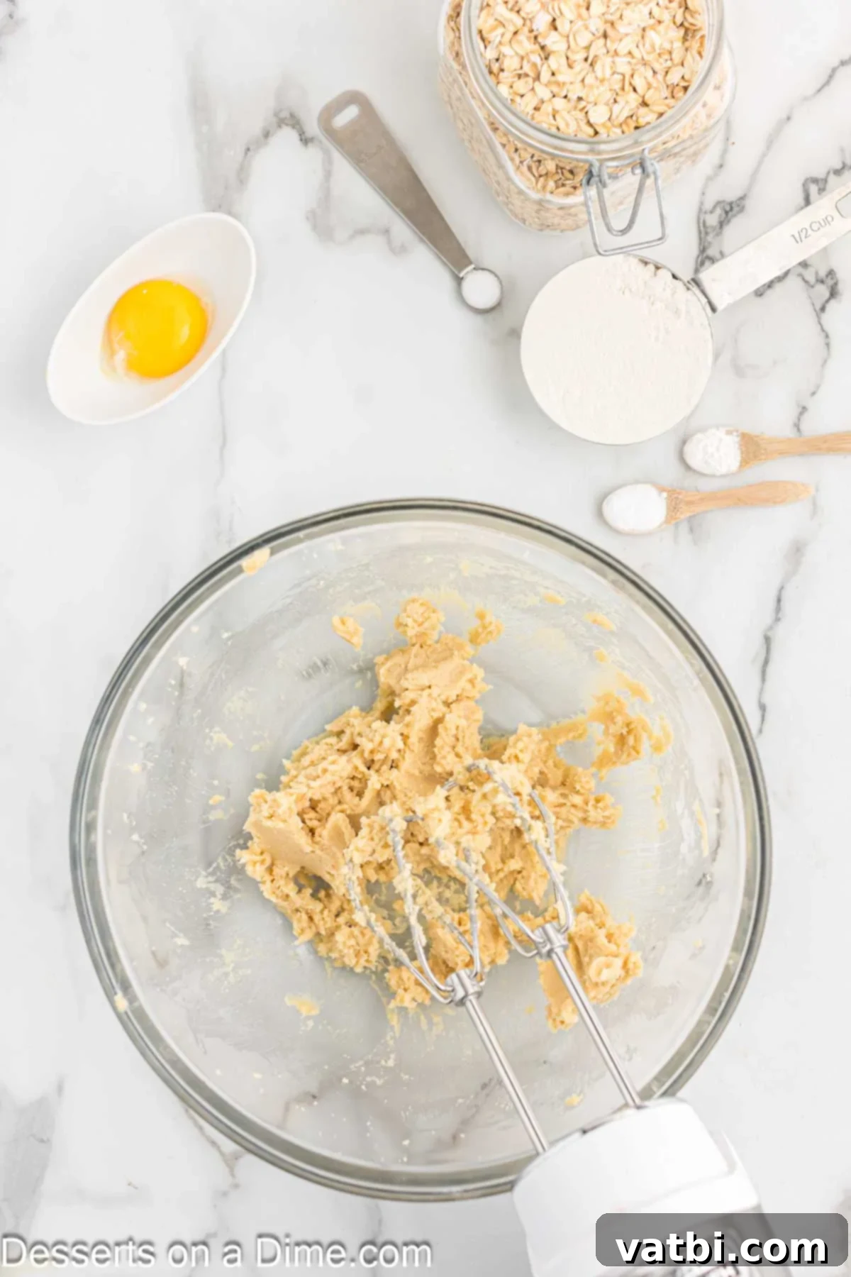 Irresistible Milk Bar Pie 4 Beating butter and sugars together in a bowl with a hand mixer
