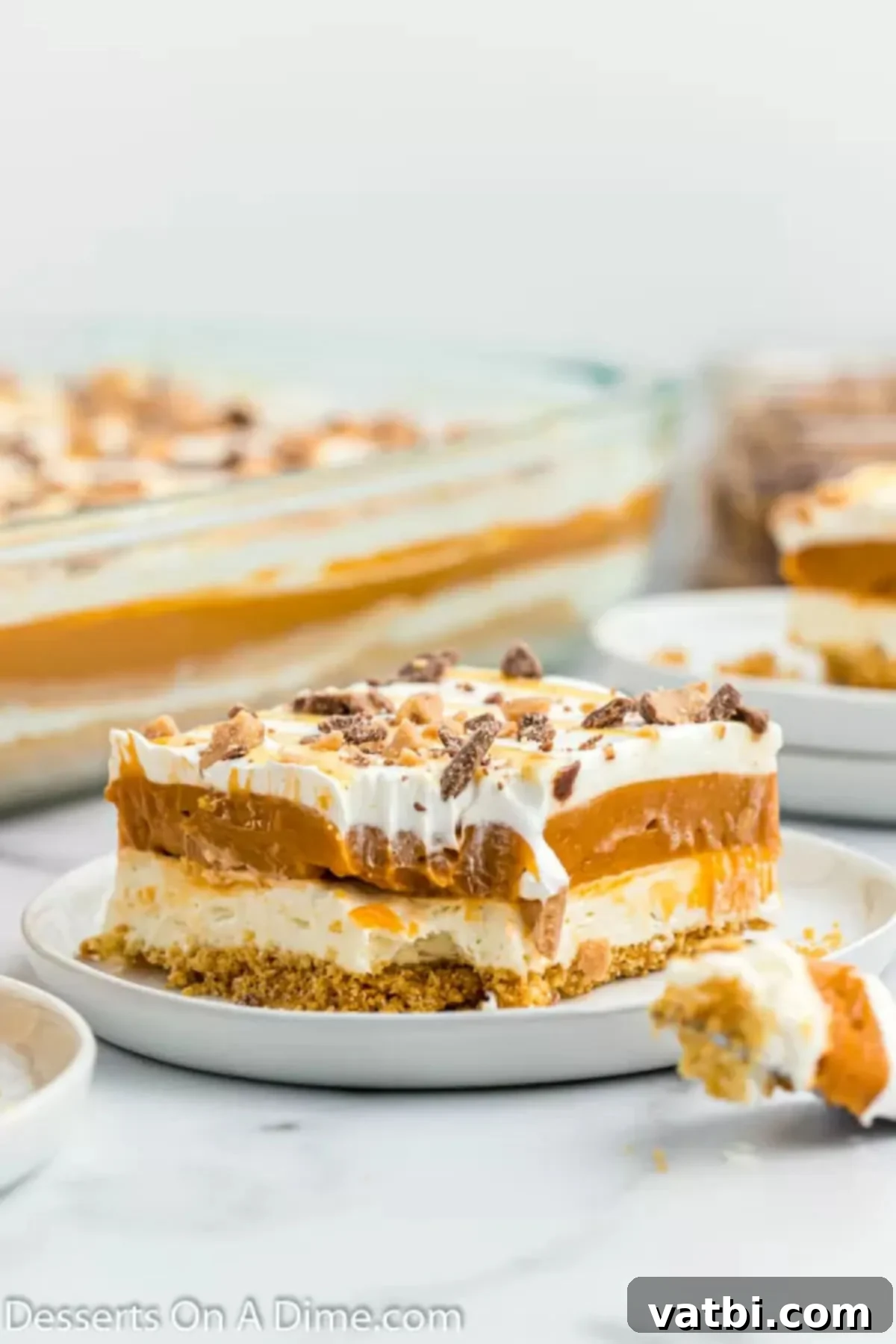 Butterscotch Bliss 2 Butterscotch Delight cut into bars on a plate.
