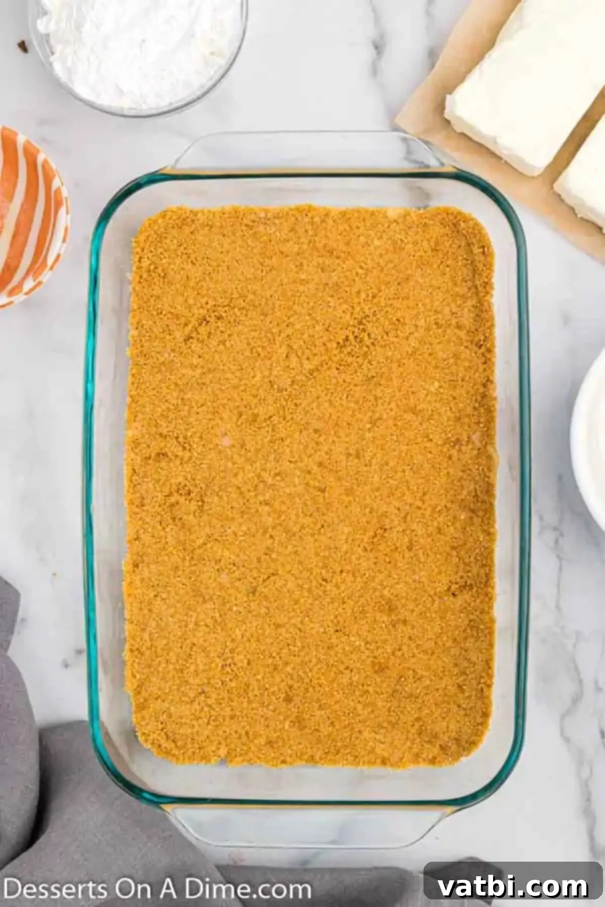 Butterscotch Bliss 5 Crumbs pressed into a baking dish.