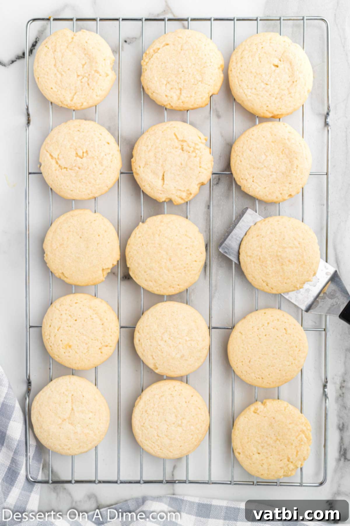 Homestyle Sugar Cookies 6 Baked sugar cookies cooling on a wire rack.