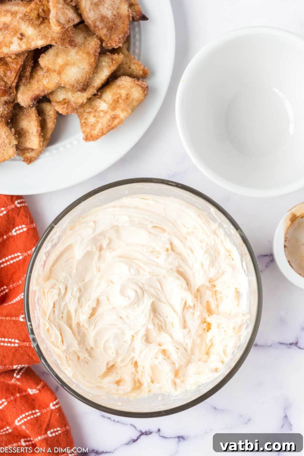 Silky Smooth Caramel Dip 3 Softened cream cheese in a bowl, ready to be beaten for the caramel dip recipe.