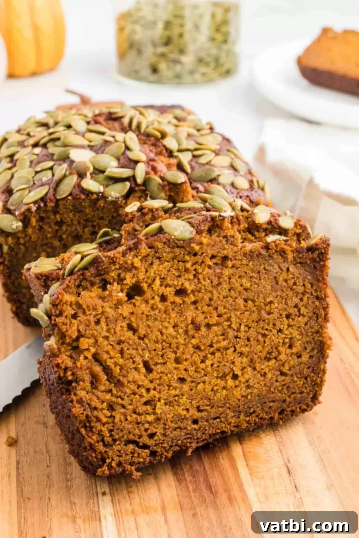 Starbucks pumpkin bread on a cutting board. 