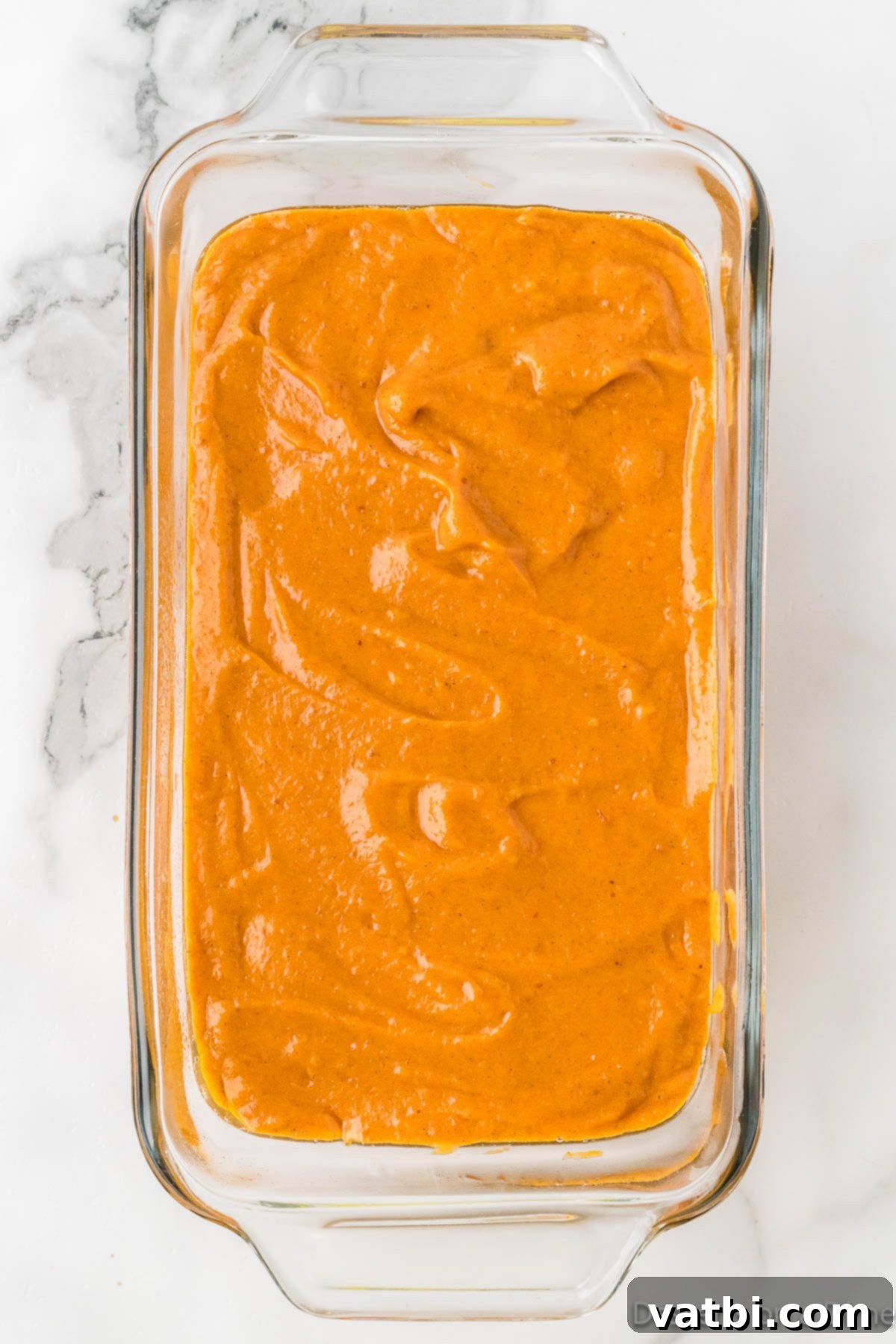 Batter poured into loaf pan. 