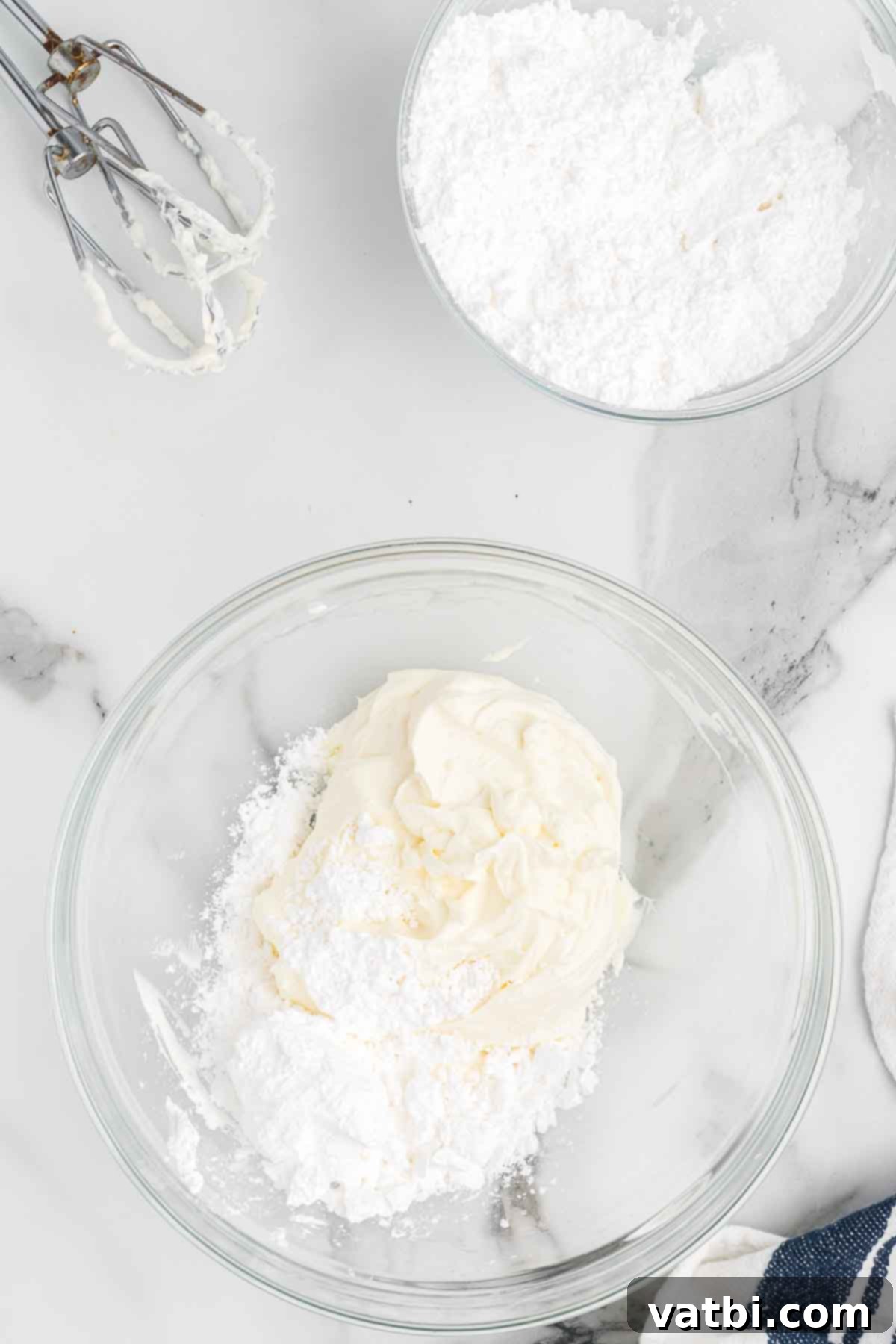 Delicious Pumpkin Dip 5 Powdered sugar added to the bowl of cream cheese.