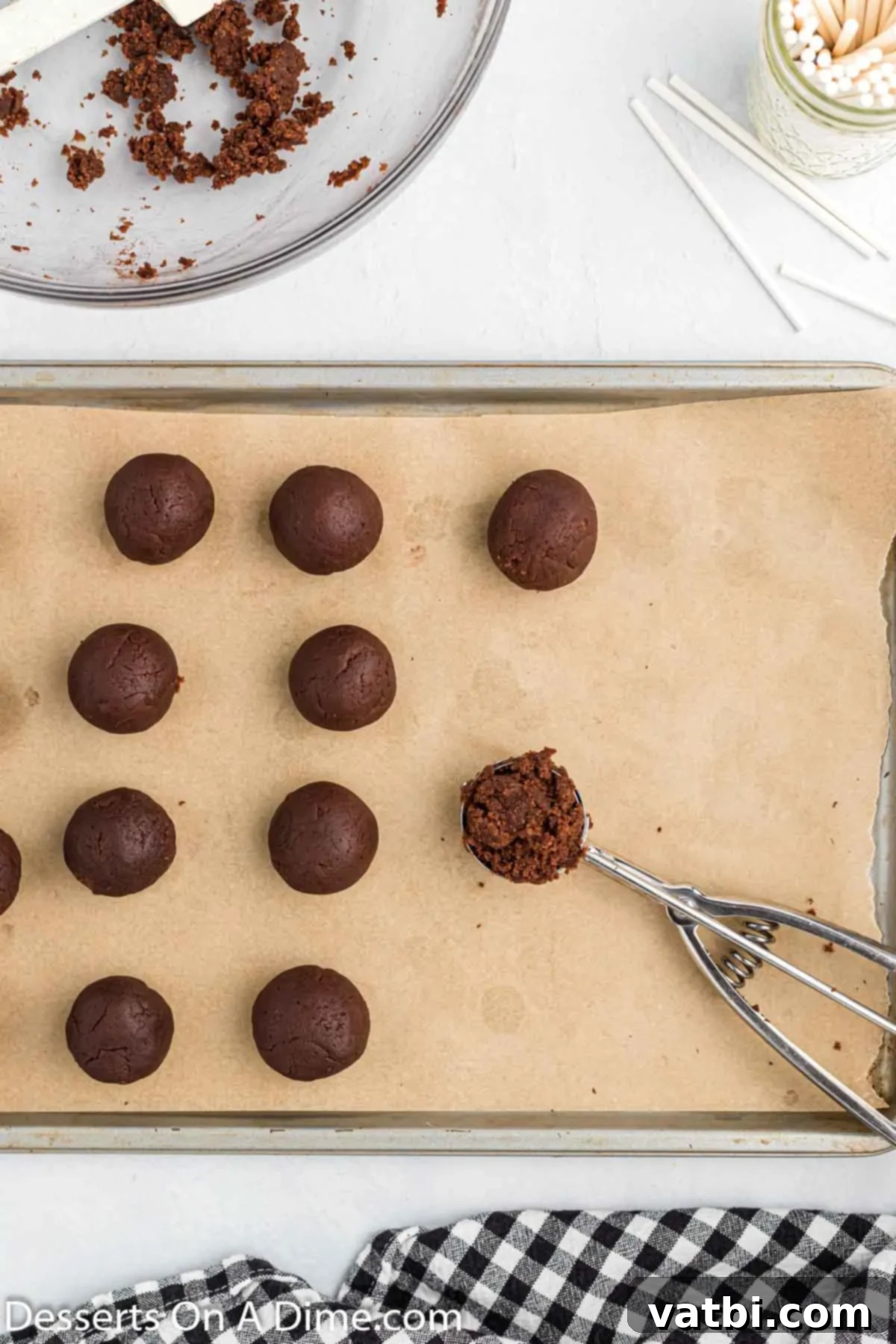 Spooky Halloween Cake Pops 6 rolling the cake into cake balls and placing on a baking sheet