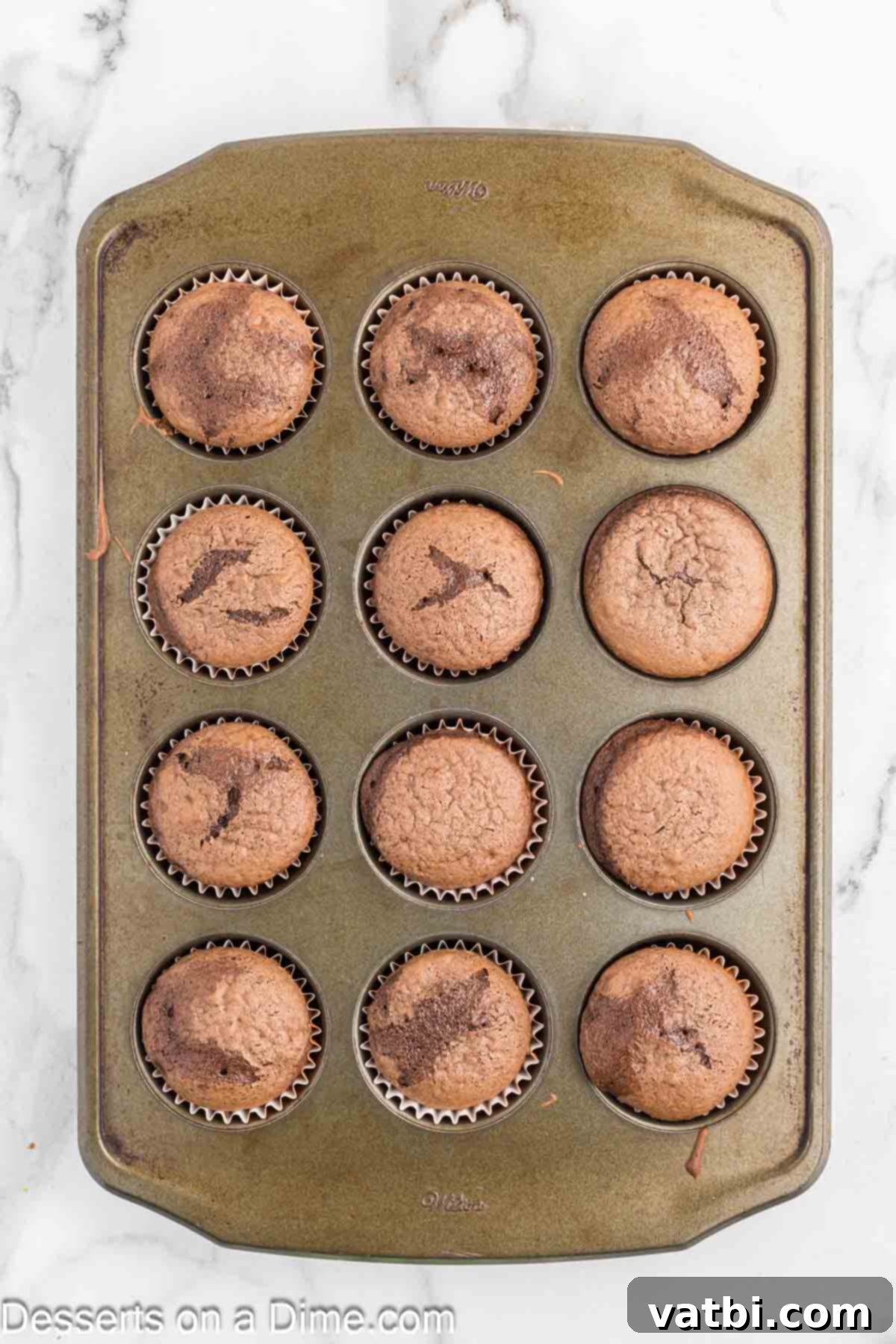 Cupcakes cooling in pan. 