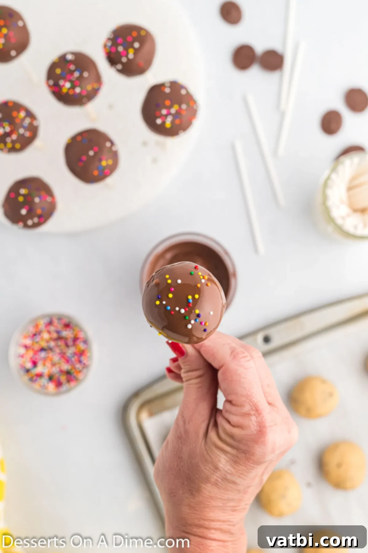 Bite-Sized Cookie Dough Bliss 11 Sprinkles added to each cake pop.