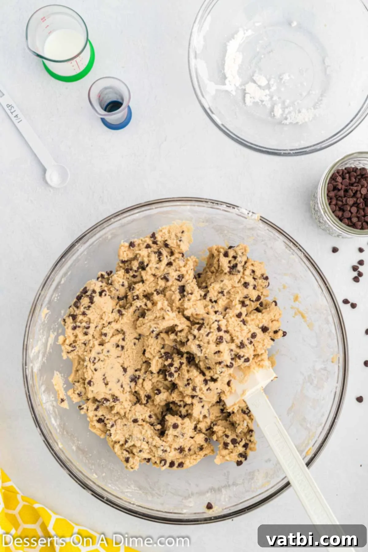 Bite-Sized Cookie Dough Bliss 7 Chocolate chips added to bowl.