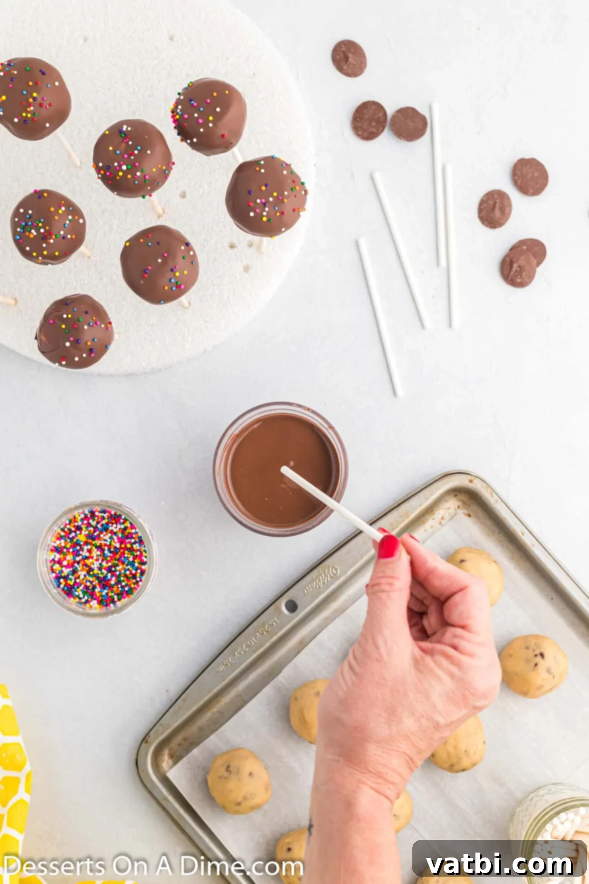 Bite-Sized Cookie Dough Bliss 9 Melted chocolate on stick.
