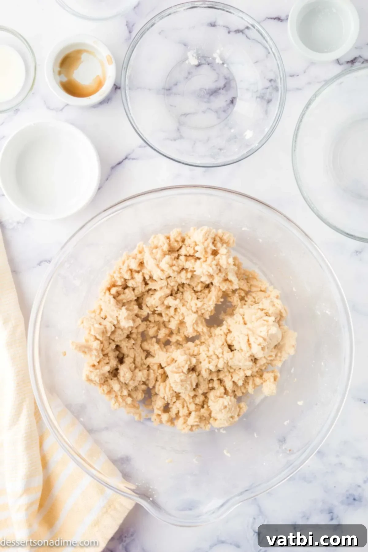 Irresistible Custard Cookies 6 Wet and dry ingredients combined in a bowl to make cookies.