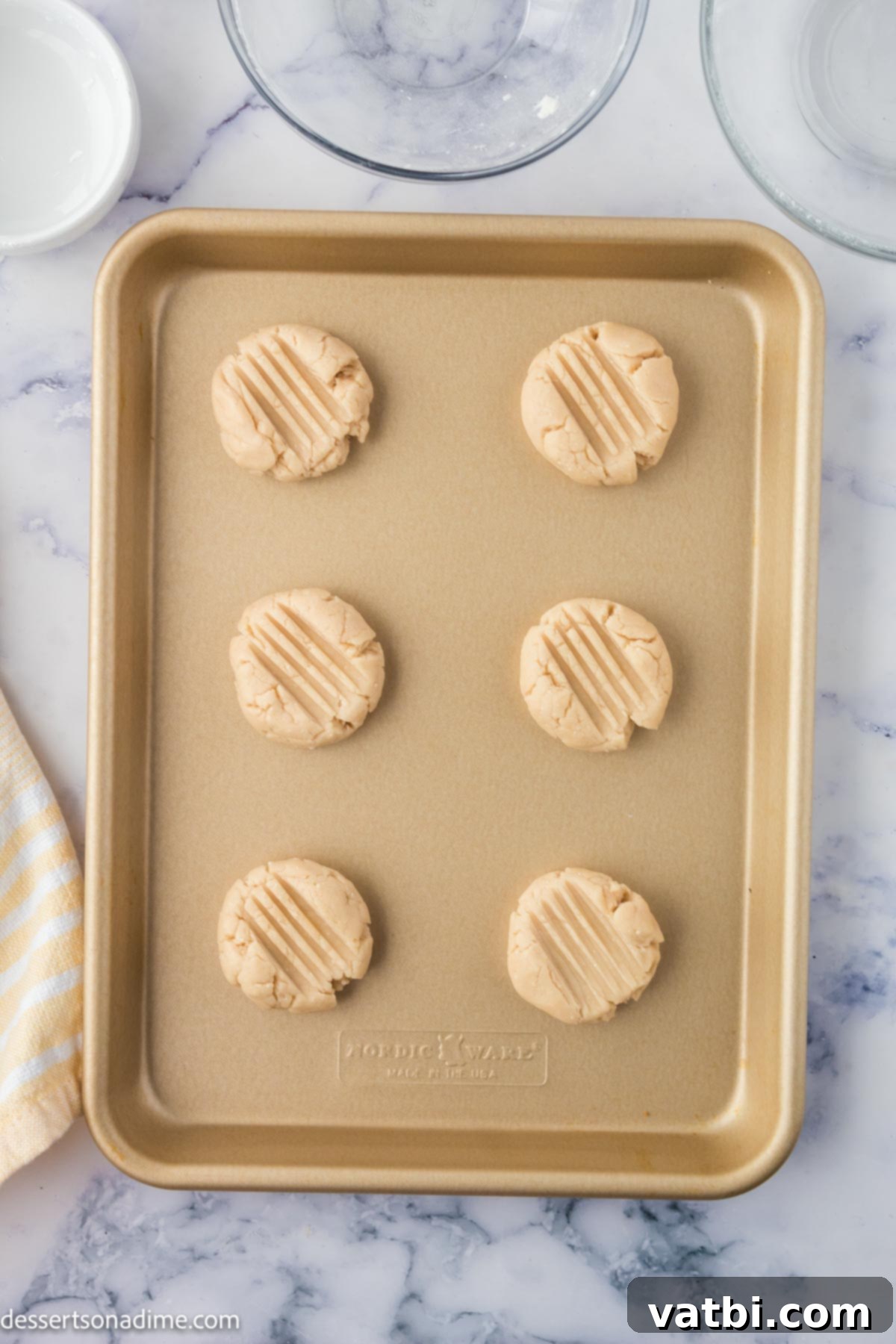 Irresistible Custard Cookies 7 Dough shaped into cookies and placed on baking sheet.