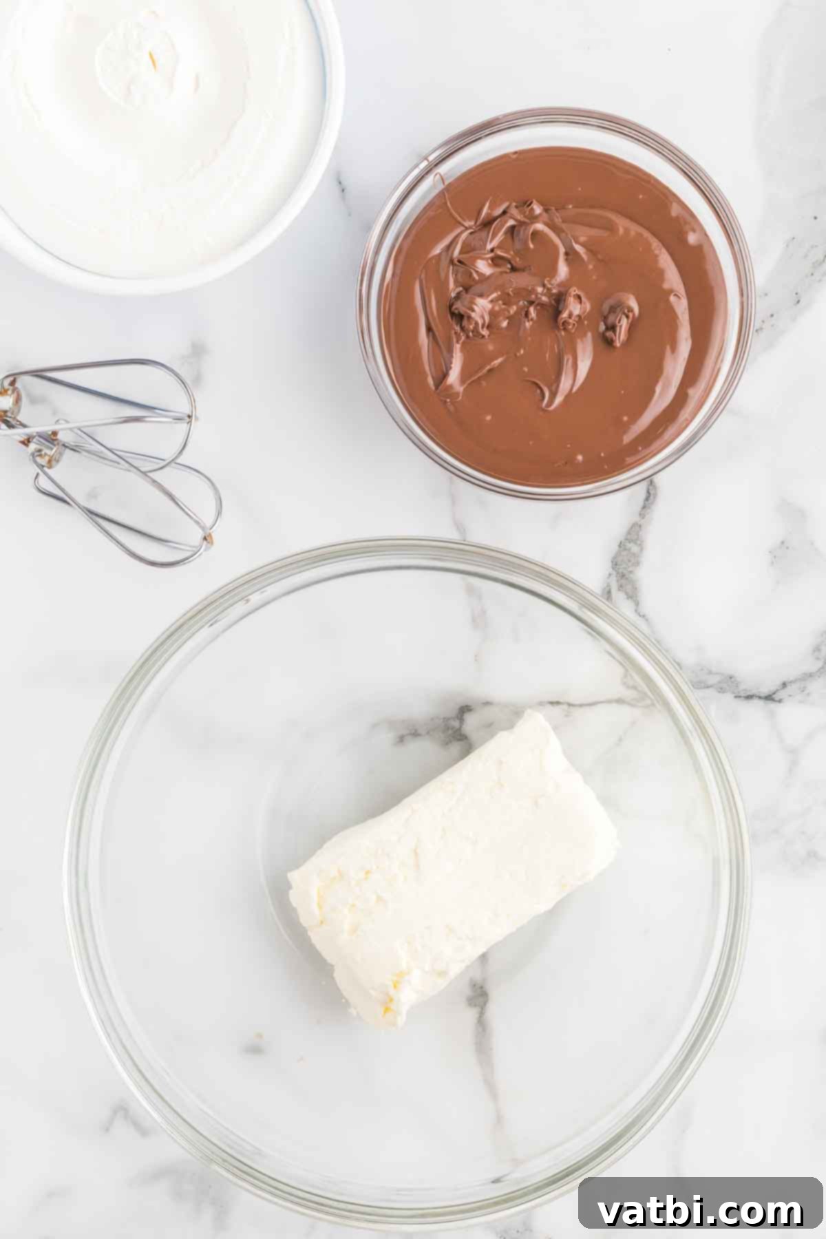 Irresistible Nutella Pie 6 Cream cheese in a bowl.