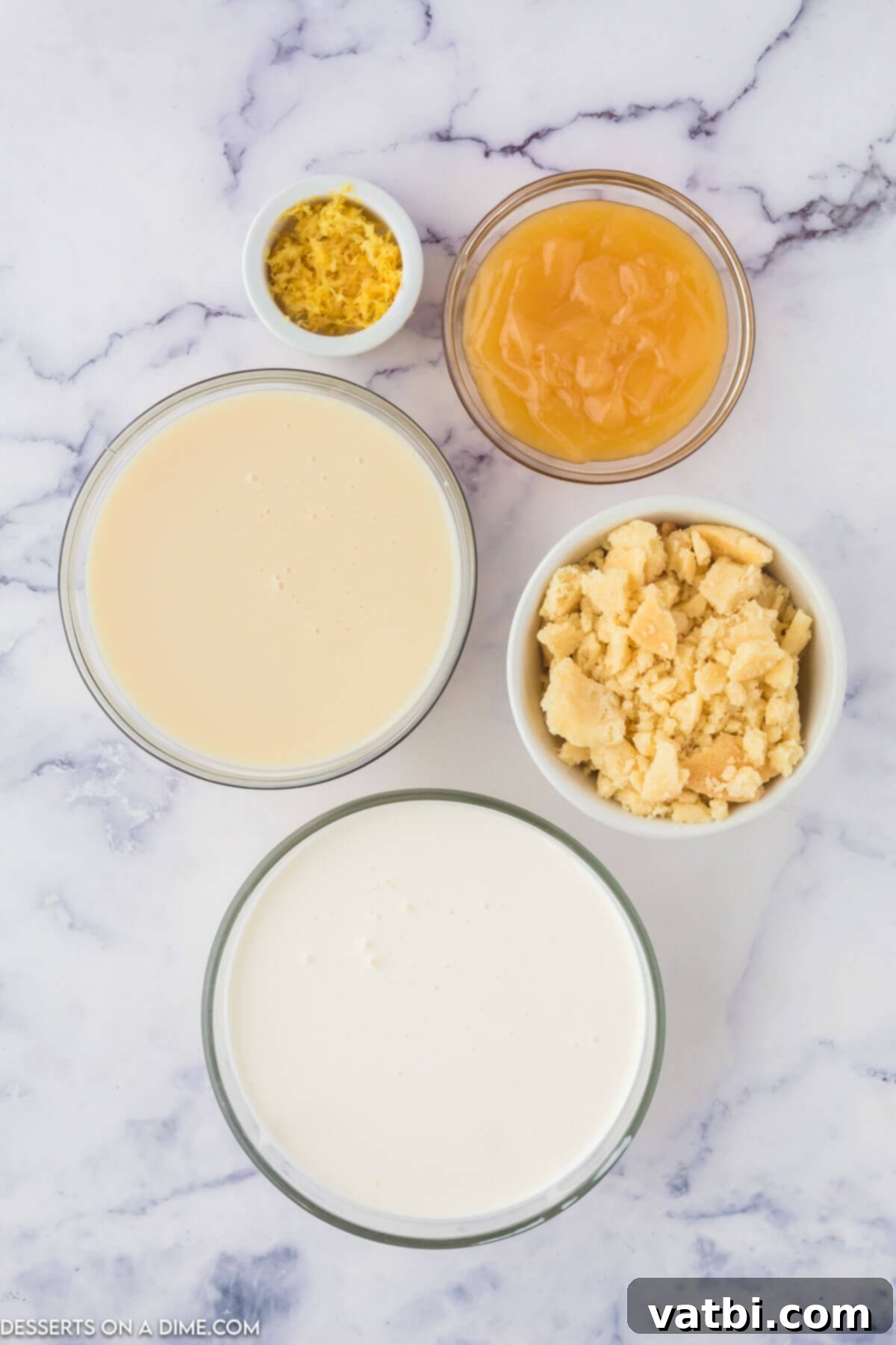 Sunshine Shortbread Ice Cream 3 Ingredients for No-Churn Lemon Shortbread Ice Cream, including heavy cream, sweetened condensed milk, lemon curd, shortbread cookies, and lemon zest.