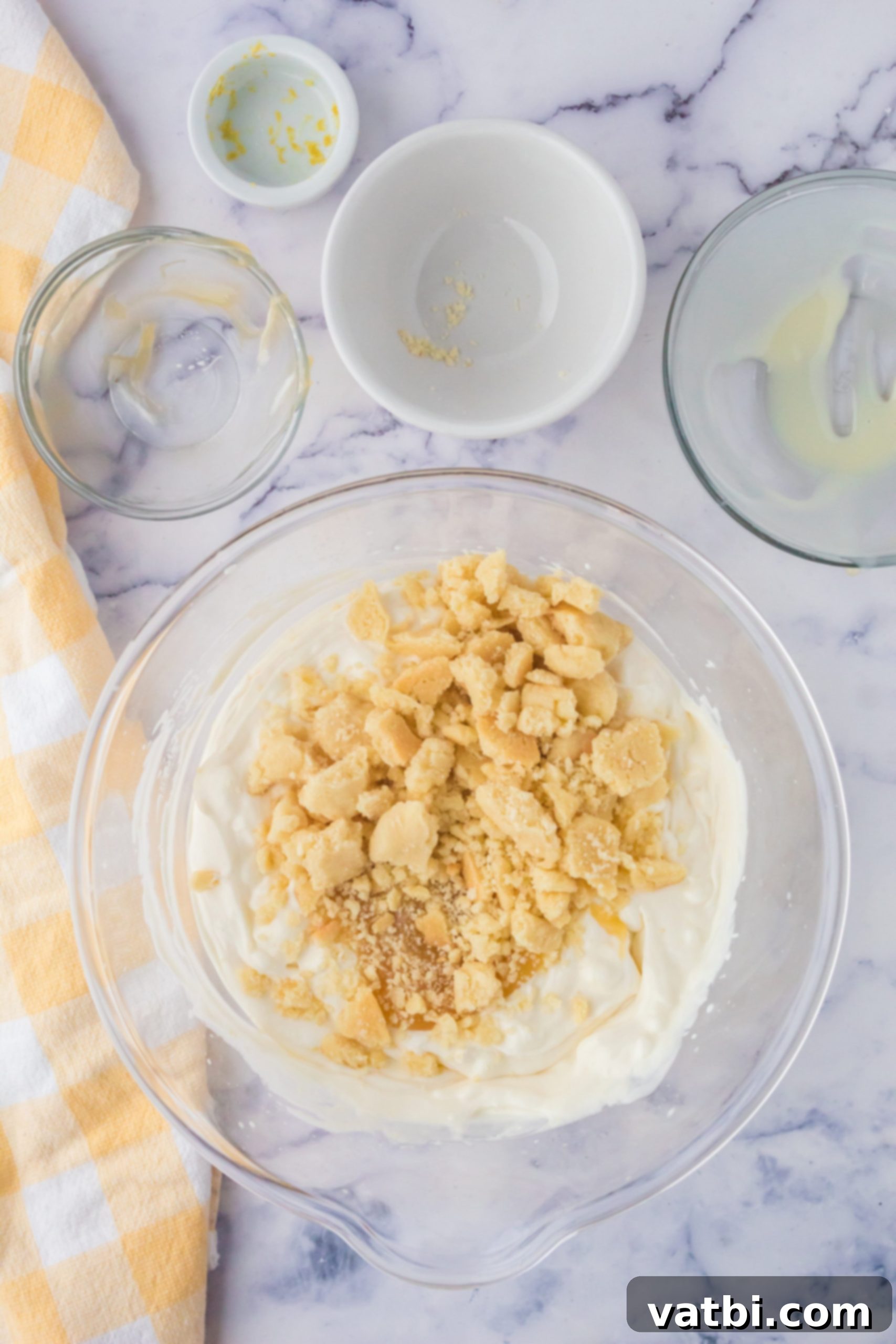 Sunshine Shortbread Ice Cream 5 Crumbled shortbread cookies and lemon curd swirled into the creamy ice cream base.