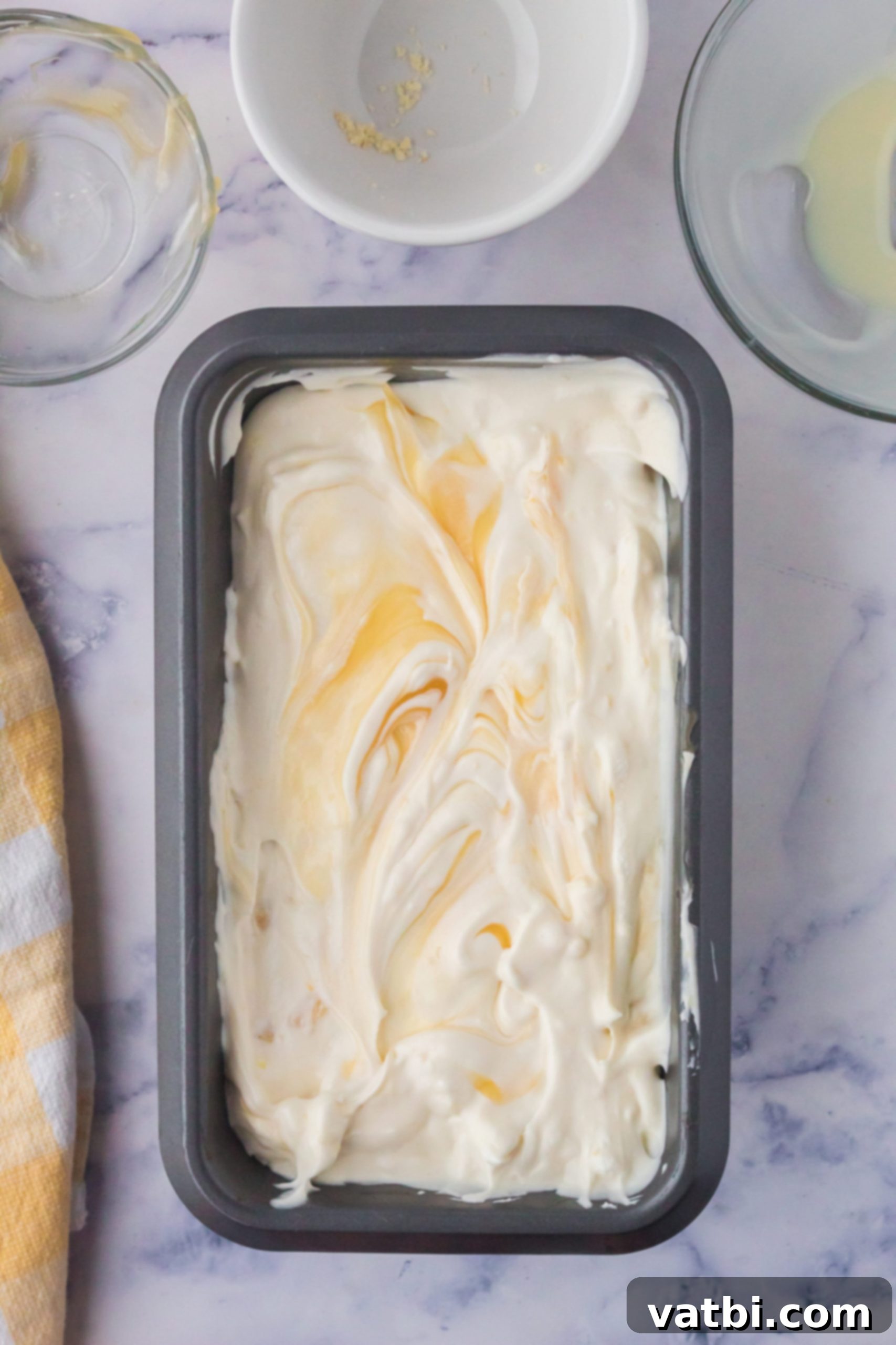 Sunshine Shortbread Ice Cream 6 Ice cream mixture transferred to a metal loaf pan, ready for freezing.