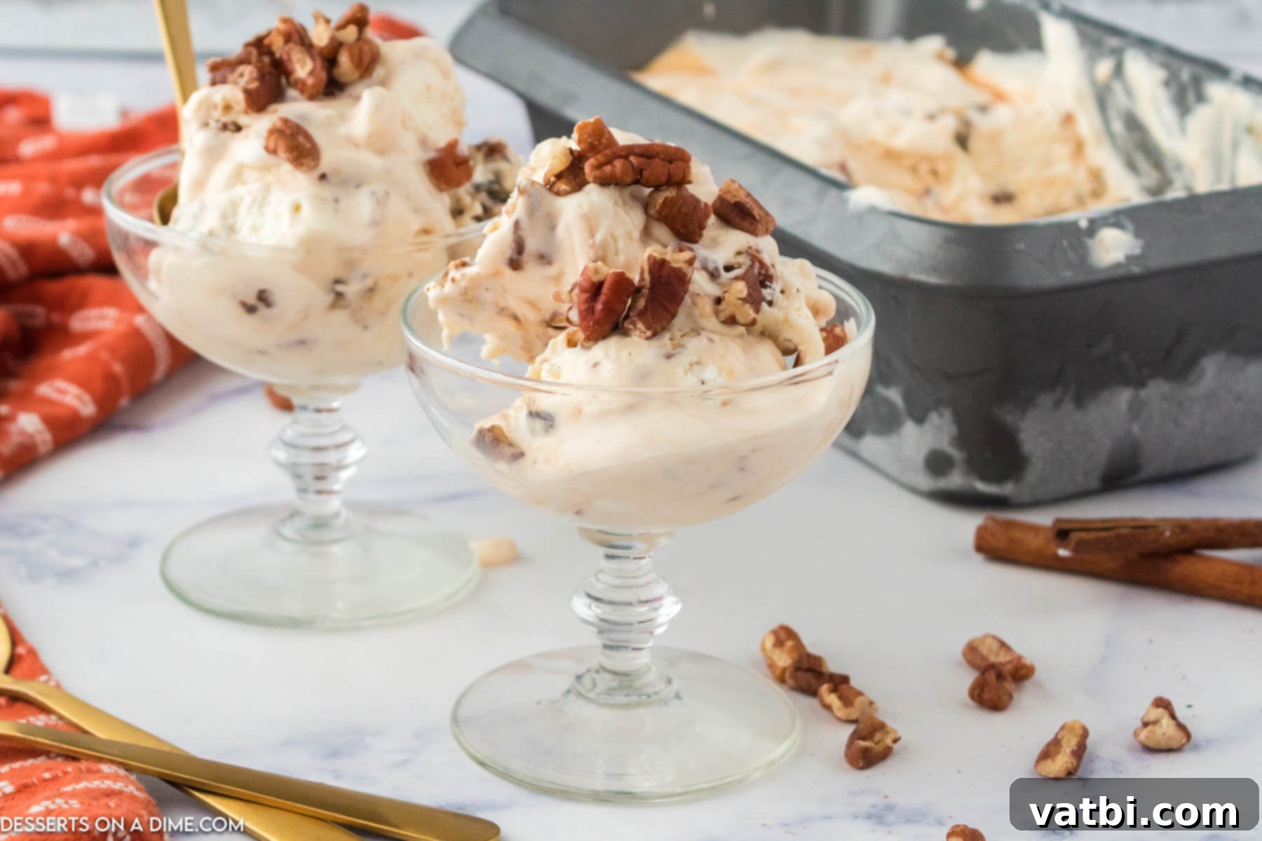 Creamy Pecan Praline Ice Cream in a bowl, topped with extra caramelized pecans.