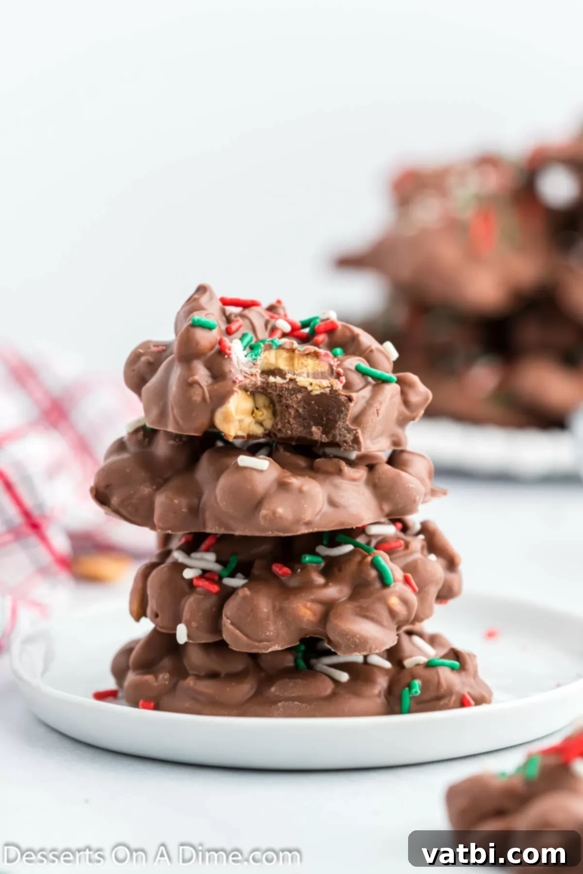 Crock pot christmas candy stacked together.